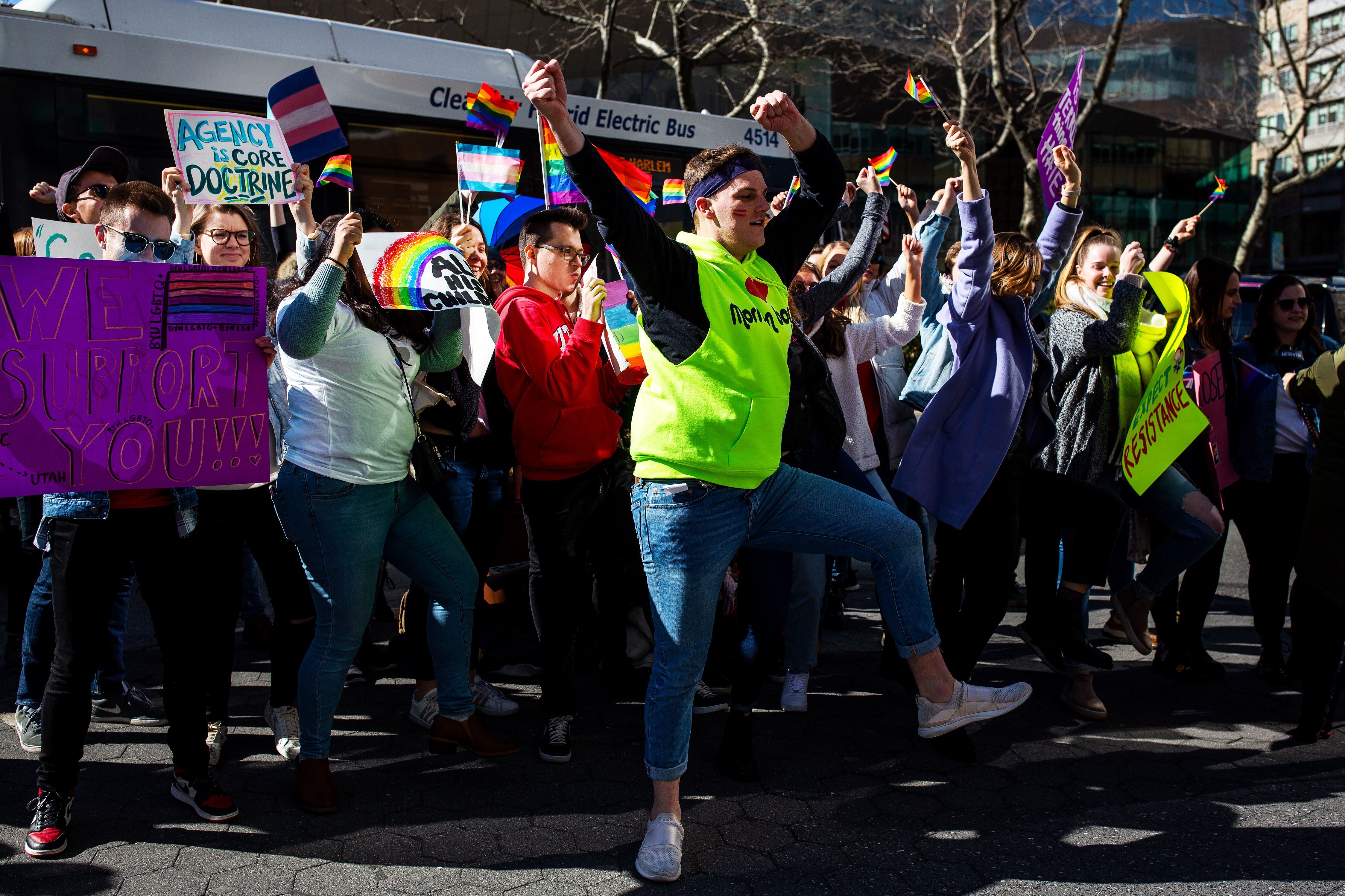 (Demetrius Freeman | for The Salt Lake Tribune) Current and former members of the Church of Jesus Christ of Latter-day Saints, the LGBTQ+ community, and supporters gather at Lincoln square across from the Mormon temple in Manhattan, New York, on March 7, 2020, to stand in solidarity with LGBTQ+ students who attending Brigham Young University. Brigham Young University reinstated homophobic policies in their student handbook that prohibit Òhomosexual behavior.Ó