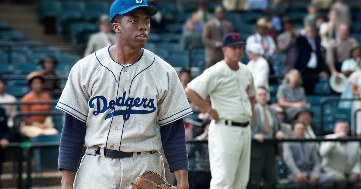 Jackie Robinson Of The Brooklyn Dodgers Photograph by New York Daily News  Archive - Pixels