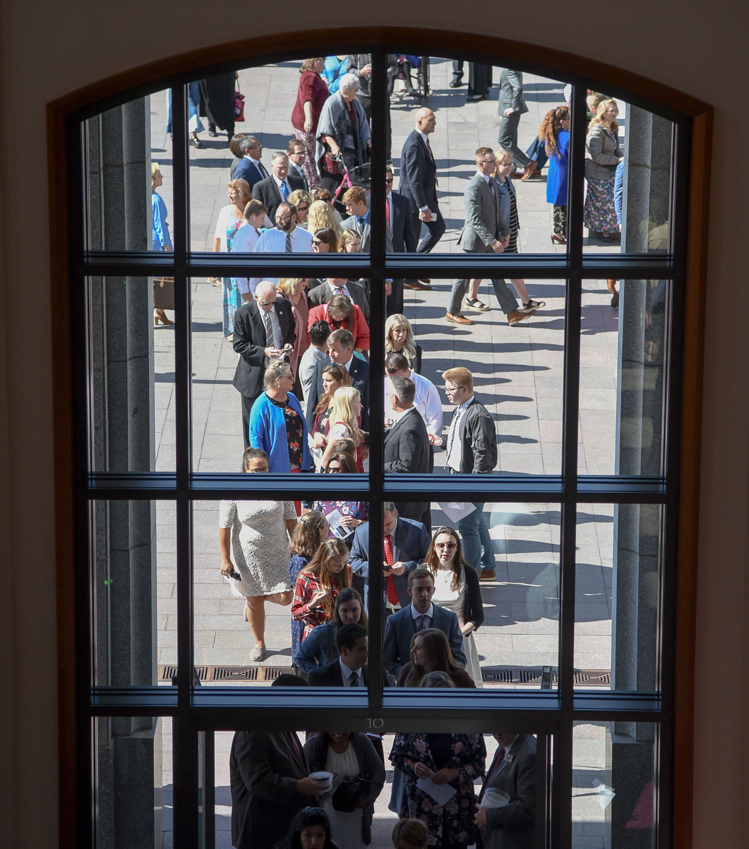 (Francisco Kjolseth | The Salt Lake Tribune) People line up to go through security during the Sunday session of the 189th twice-annual General Conference of The Church of Jesus Christ of Latter-day Saints at the Conference Center in Salt Lake City on Sunday, Oct. 6, 2019.