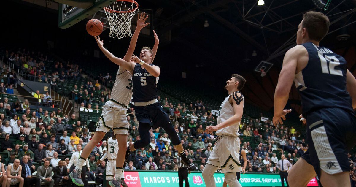 Utah State clinches share of MWC title with 100-96 victory over ...