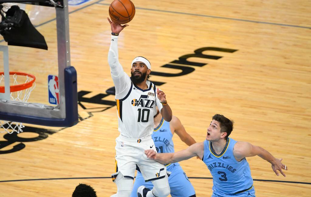 Mike Conley warmed up with Jazz teammates despite knowing he was