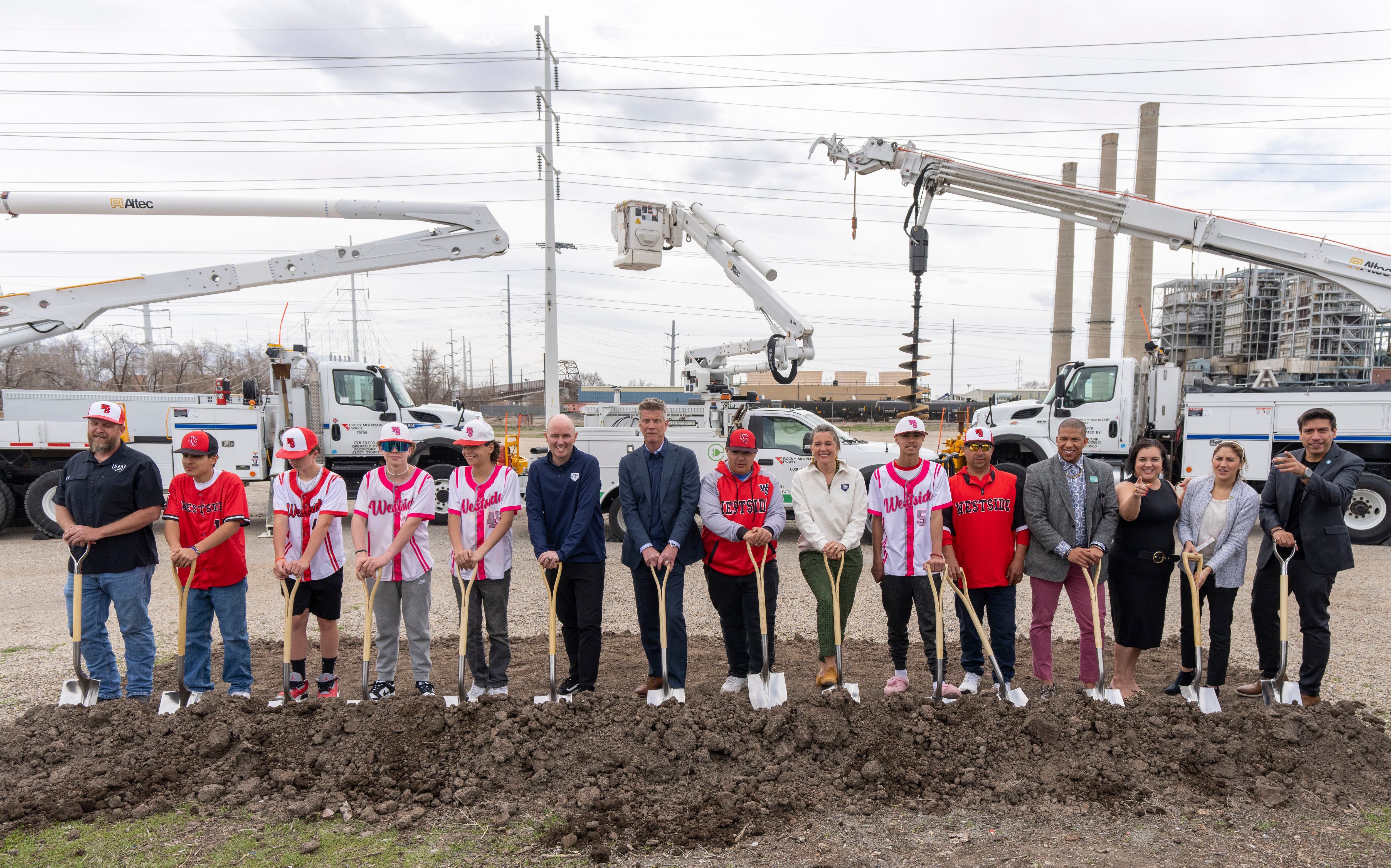 (Rick Egan | The Salt Lake Tribune) Gov. Spencer Cox, Salt Lake City Mayor Erin Mendenhall, Salt Lake City Council members, Jordan River Commission leadership, community council leaders, Rocky Mountain Power executives, and baseball players from the west side, pose for a photo during a news conference on the Power District development on the west side of Salt Lake City, including a possible Major League Baseball park, on Wednesday, April 12, 2023. 