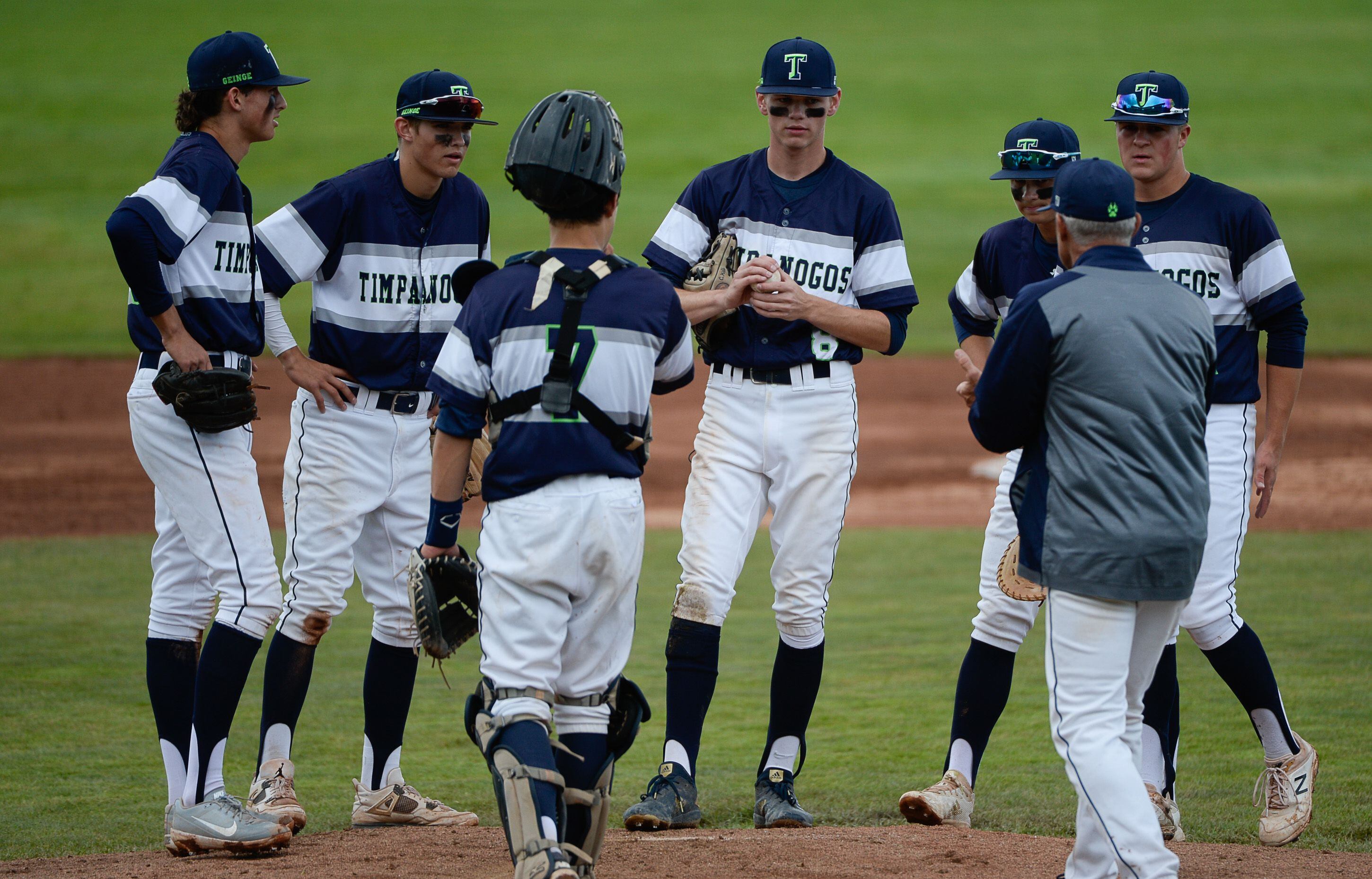 (Francisco Kjolseth | The Salt Lake Tribune) Timpanogos pitcher Carter Wilde, center right, wraps up his time on the mound against Cottonwood during the 5A baseball championship game at UCCU Stadium on the UVU campus in Orem, Friday, May 24, 2019.