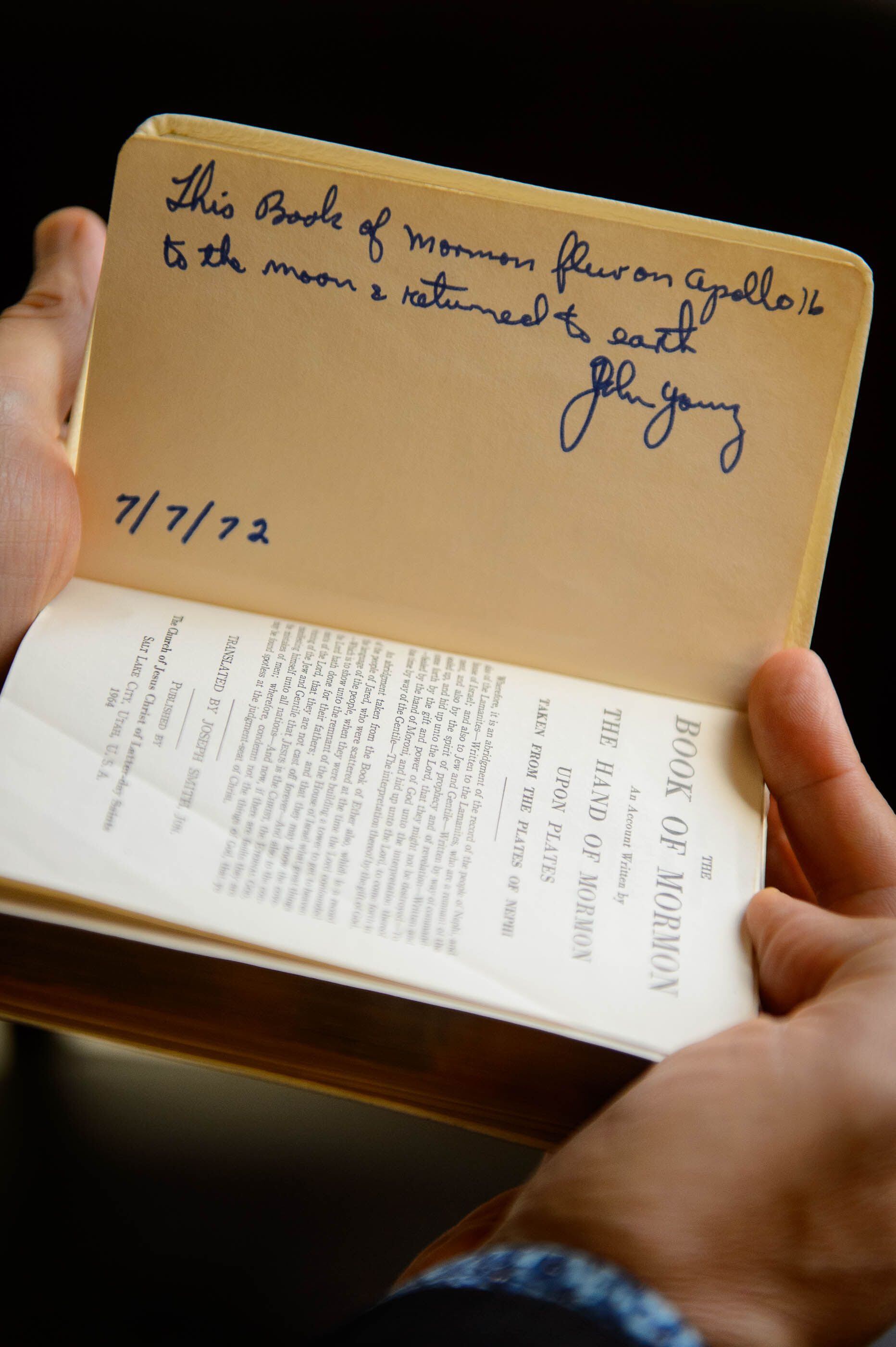 (Trent Nelson | The Salt Lake Tribune) Astronaut John Young's signature on a Book of Mormon that went to the moon in 1972. Photographed in Salt Lake City on Wednesday Oct. 2, 2019.