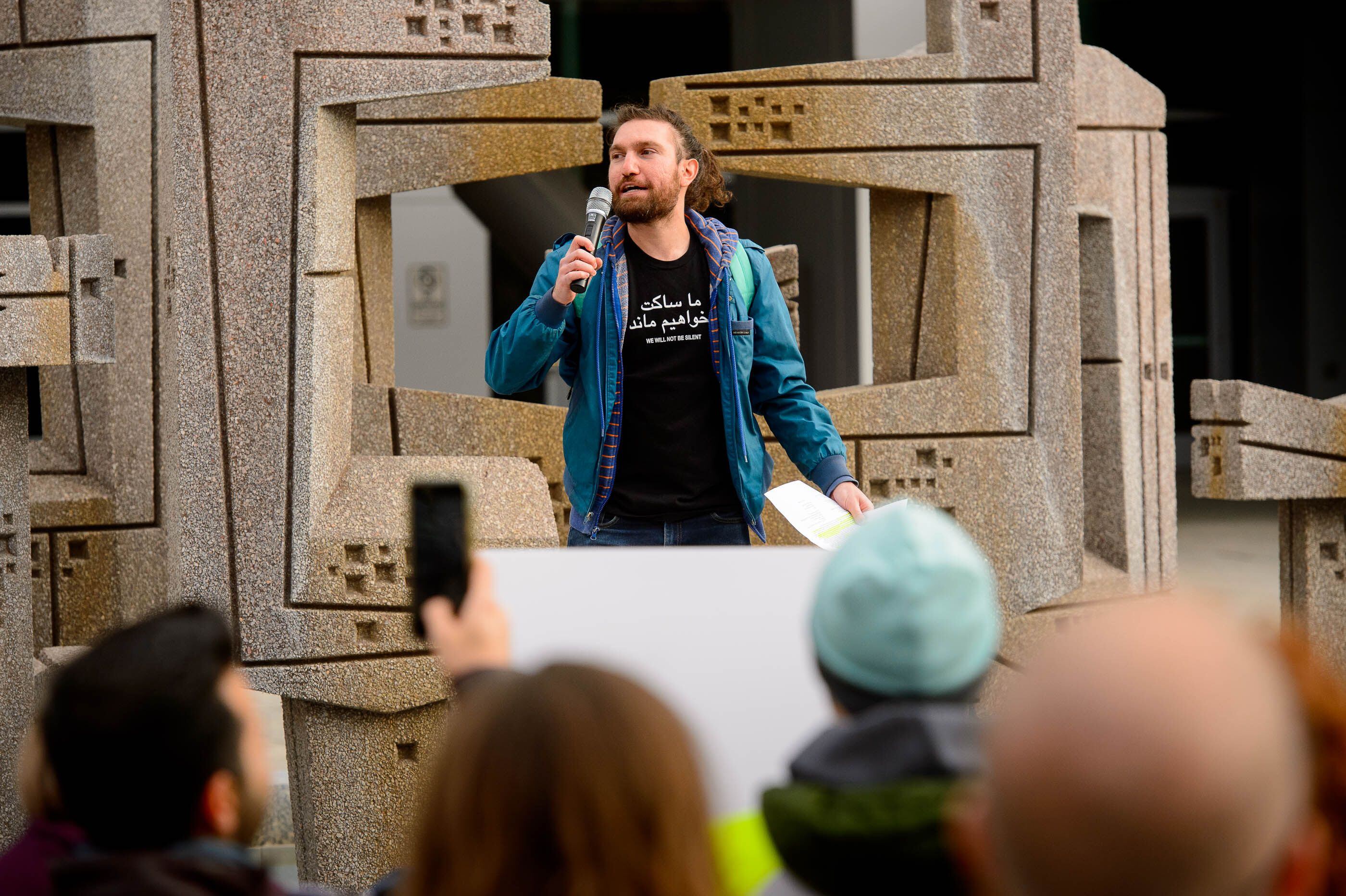 (Trent Nelson | The Salt Lake Tribune) Alborz Ghandehari speaks as people gather in front of the Federal Building in Salt Lake City on Saturday, Jan. 4, 2020 to protest the escalation of tensions with Iran.