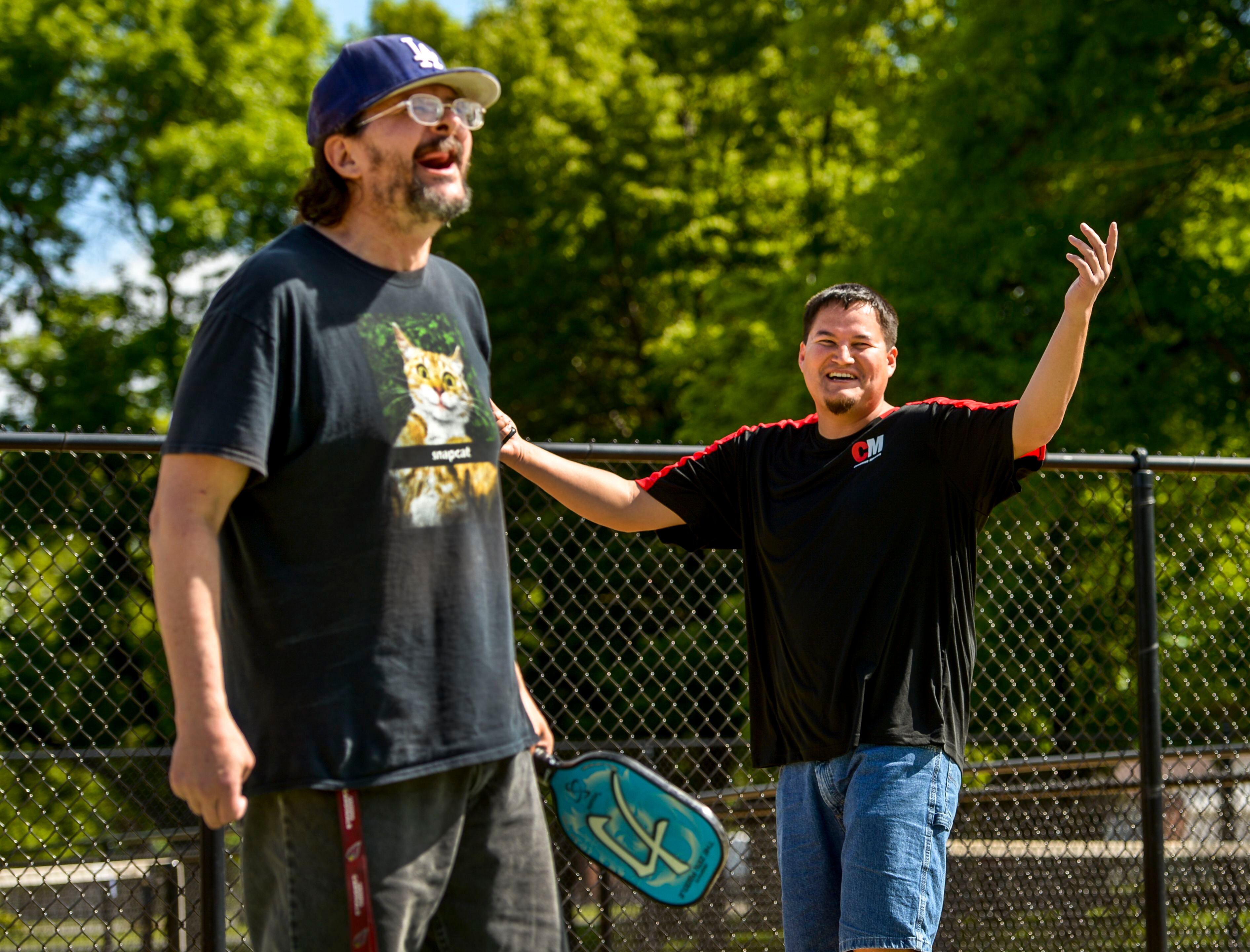 (Leah Hogsten | The Salt Lake Tribune) l-r Veterans Peter Gray and Dakoda Antelope share a laugh while playing pickleball at Hogan Park in Bountiful, May 14, 2019.