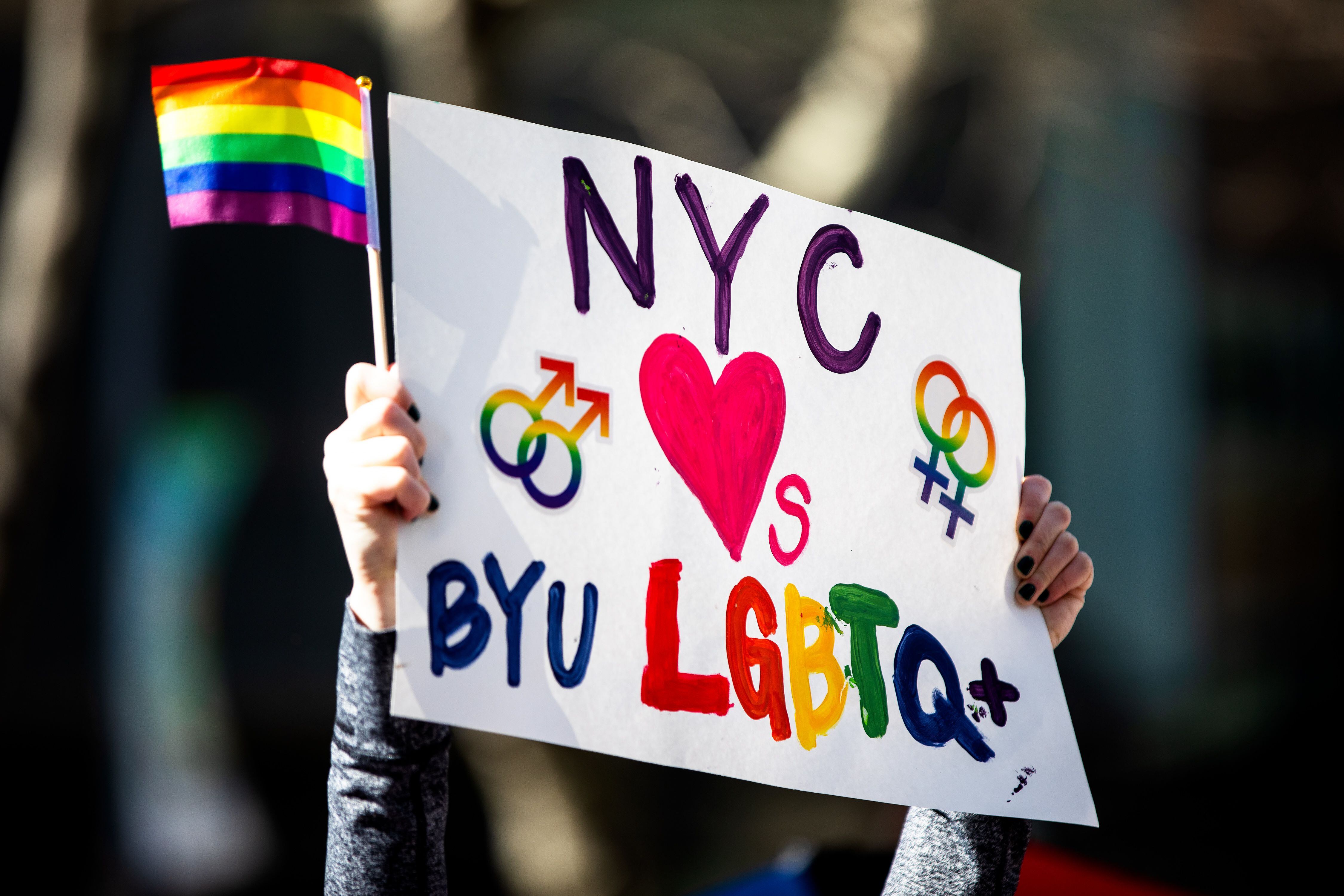 (Demetrius Freeman | for The Salt Lake Tribune) Current and former members of the Church of Jesus Christ of Latter-day Saints, the LGBTQ+ community, and supporters gather at Lincoln square across from the Mormon temple in Manhattan, New York, on March 7, 2020, to stand in solidarity with LGBTQ+ students who attending Brigham Young University. Brigham Young University reinstated homophobic policies in their student handbook that prohibit Òhomosexual behavior.Ó