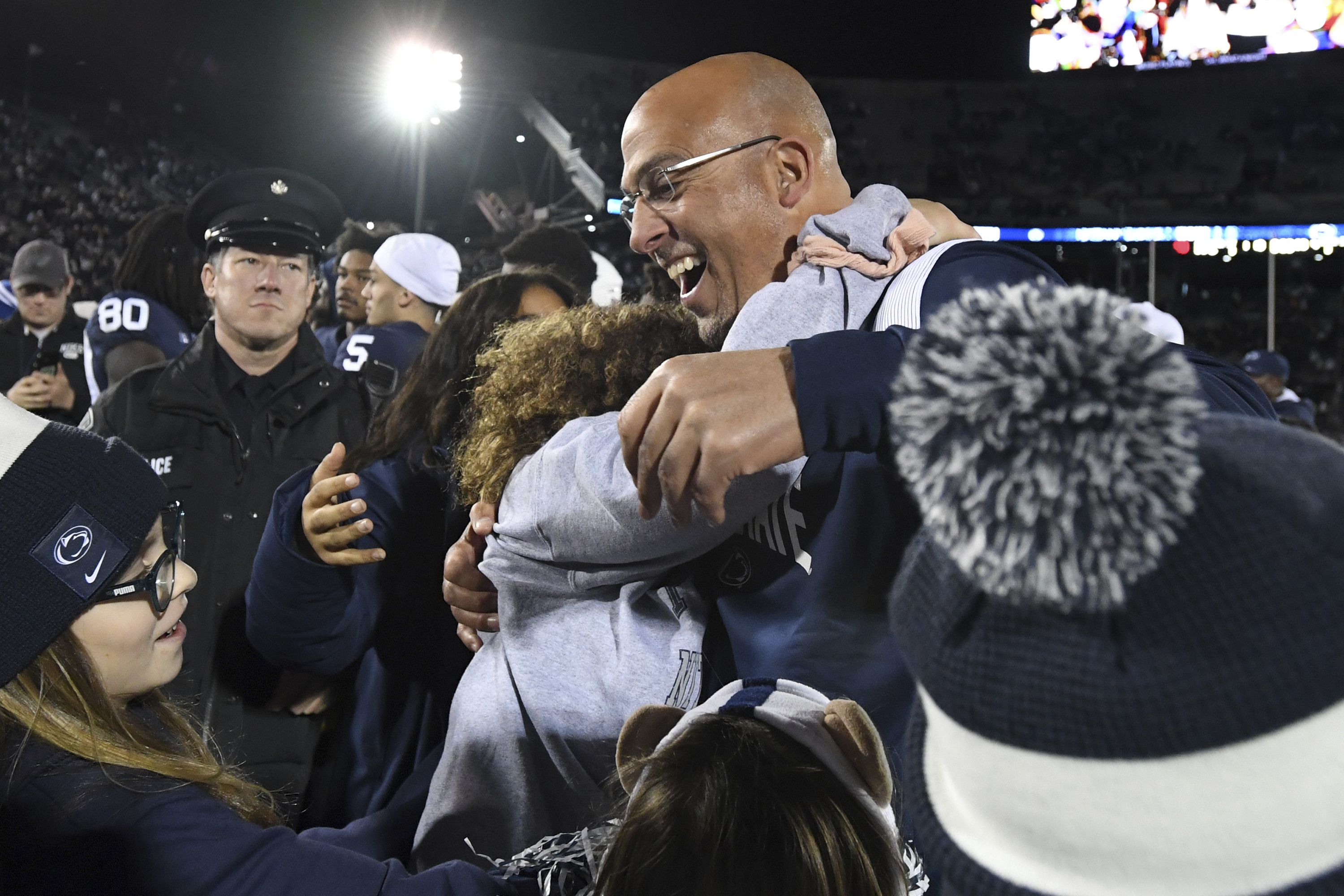 (Barry Reeger | AP) Penn State head coach James Franklin celebrates with his daughter Addy following a 35-16 victory over Michigan State during an NCAA college football game, Saturday, Nov. 26, 2022, in State College, Pa.