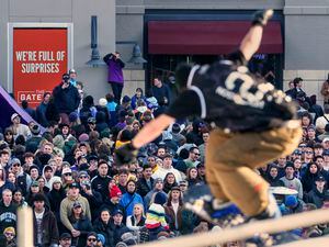 (Leah Hogsten | The Salt Lake Tribune) Snowboarder Dusty Hendrickson from Big Bear, Calif., throws down tricks on handrails at GRIT Rail Jam at The Gateway's Olympic Plaza on Feb. 18, 2023 as part of the NBA All-Star Weekend.