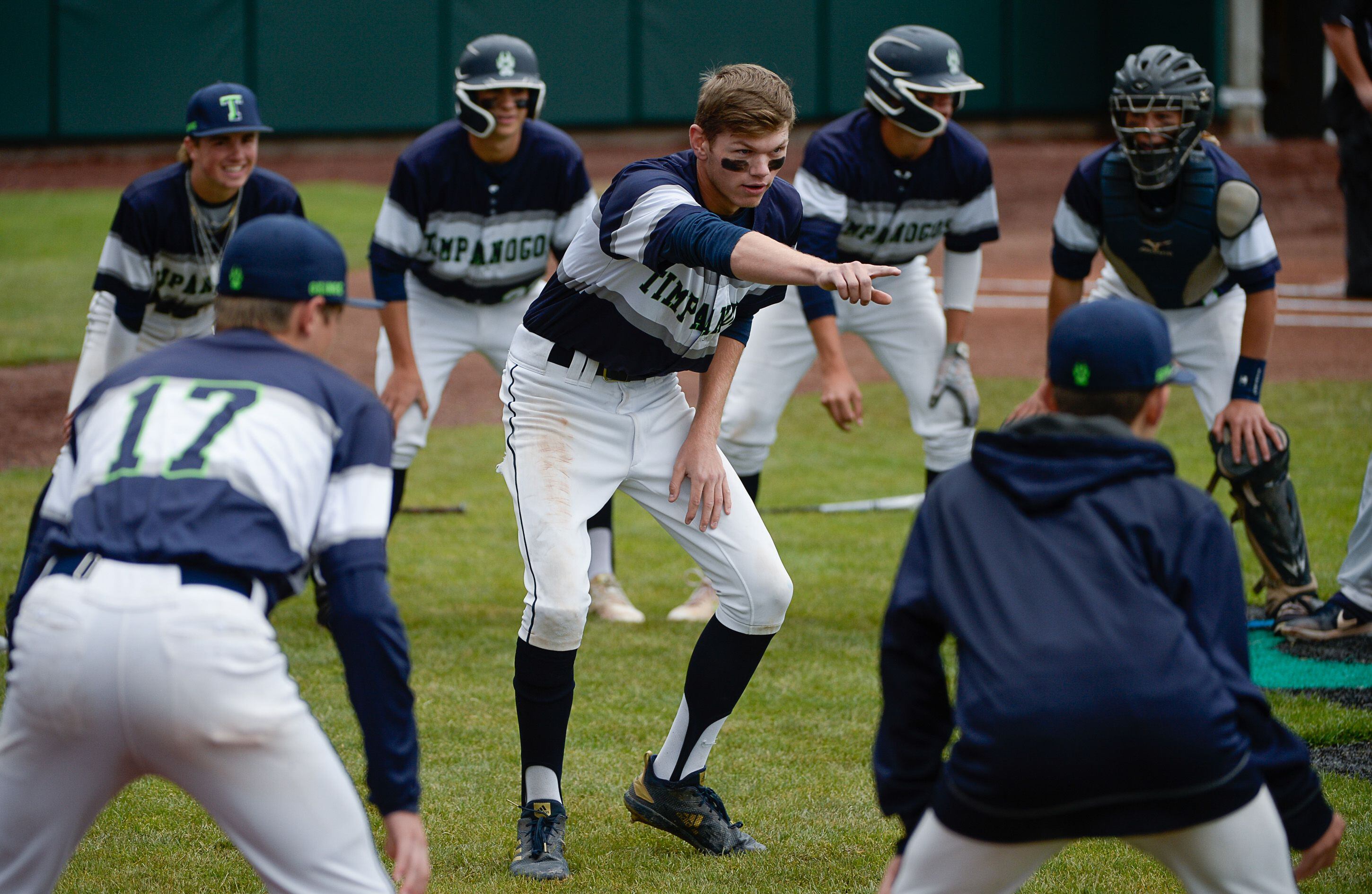 (Francisco Kjolseth | The Salt Lake Tribune) Timpanogos does the pre-game warm up routine before taking on Cottonwood in the 5A baseball championship game at UCCU Stadium on the UVU campus in Orem, Friday, May 24, 2019.