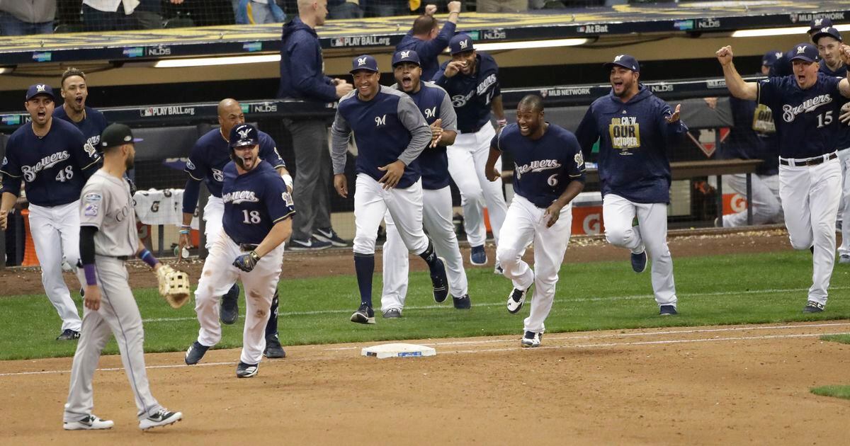 Brewers' Mike Moustakas shows new crew, new home how to reign in October