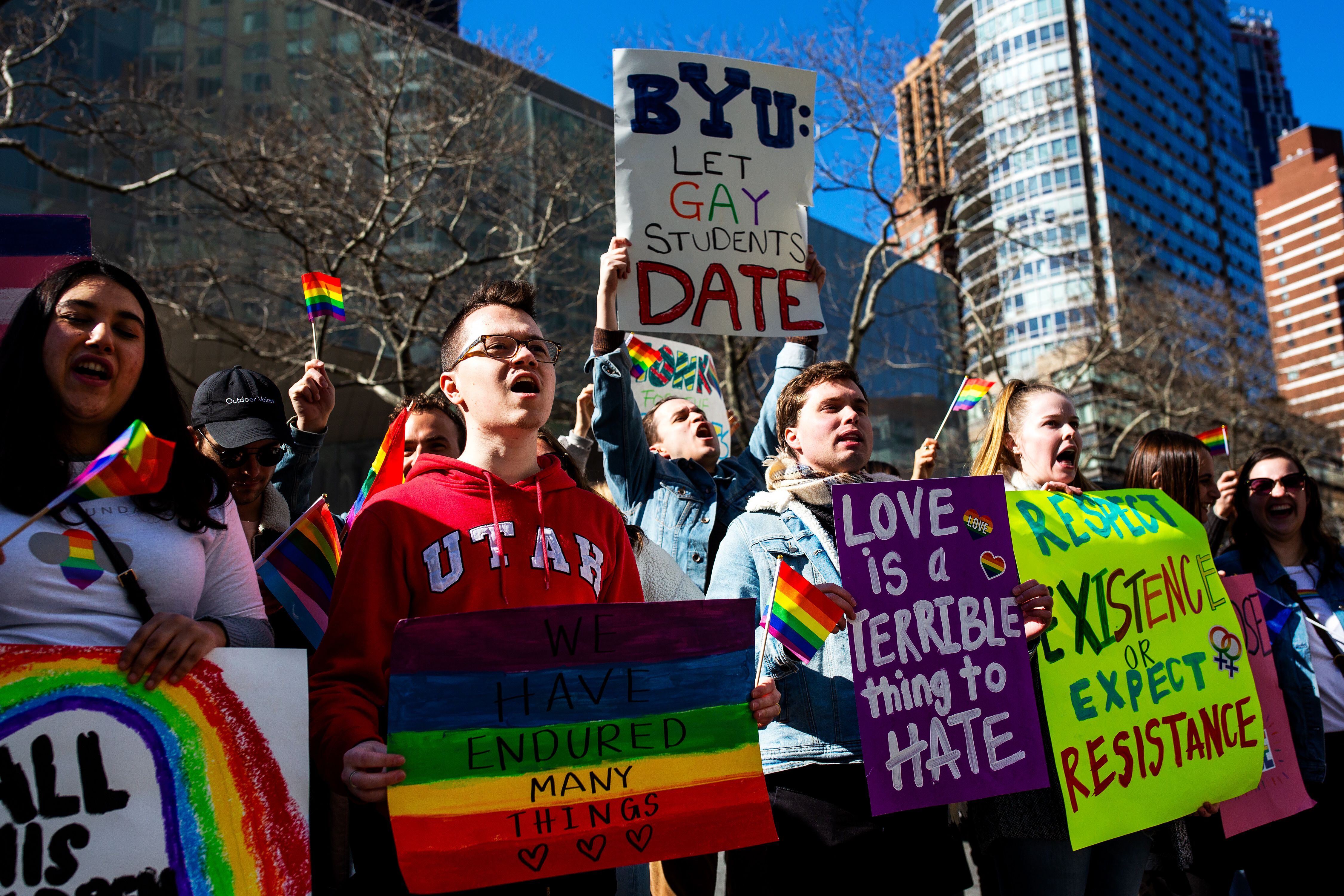 (Demetrius Freeman | for The Salt Lake Tribune) Current and former members of the Church of Jesus Christ of Latter-day Saints, the LGBTQ+ community, and supporters gather at Lincoln square across from the Mormon temple in Manhattan, New York, on March 7, 2020, to stand in solidarity with LGBTQ+ students who attending Brigham Young University. Brigham Young University reinstated homophobic policies in their student handbook that prohibit Òhomosexual behavior.Ó