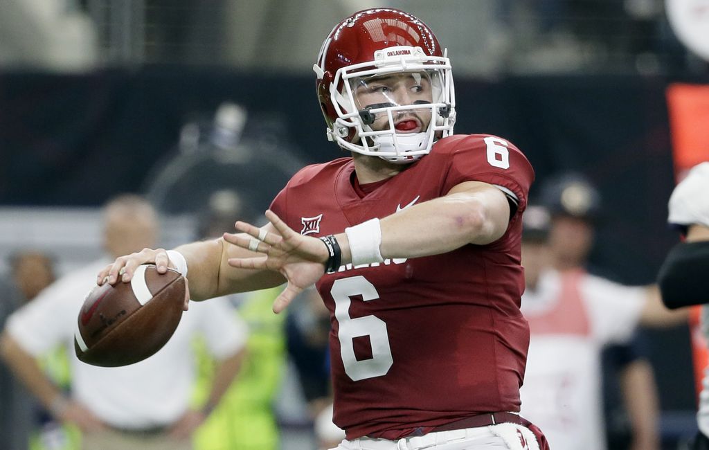 Watch OU QB Baker Mayfield hit a TCU player in the head with throw