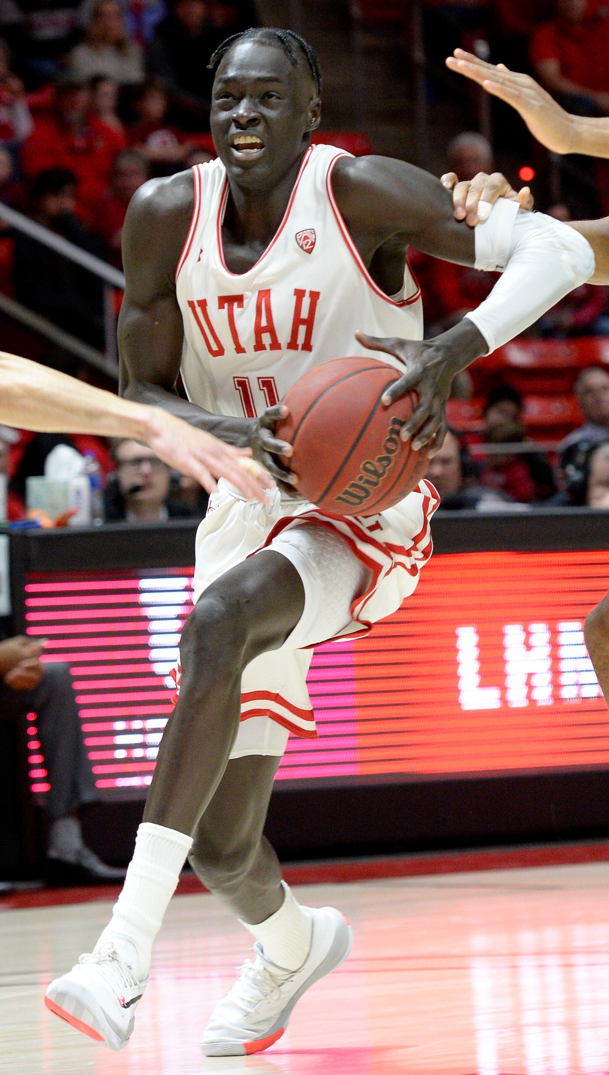 (Leah Hogsten | The Salt Lake Tribune) Utah Utes guard Both Gach (11) drives the court as the University of Utah basketball team hosts No. 4 Oregon, Jan. 4, 2020, at the Huntsman Center.