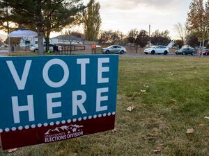 (Rick Egan | The Salt Lake Tribune) Voters in cars line up to drop off their ballots in Lehi, on Tuesday, Nov. 3, 2020.