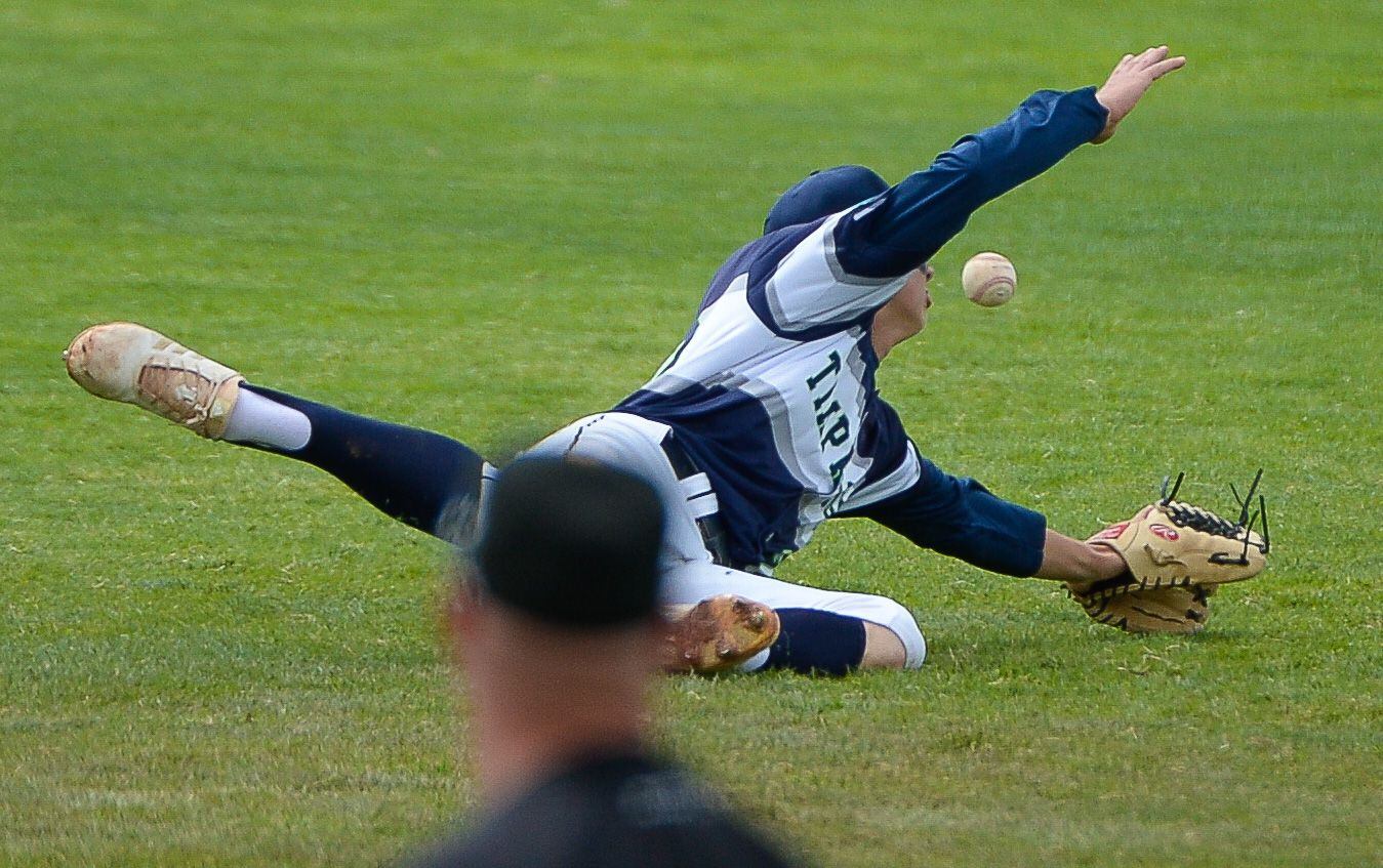 (Francisco Kjolseth | The Salt Lake Tribune) Ethan Hixson of Timpanogos comes up short on a hit from Cottonwood during the 5A baseball championship game at UCCU Stadium on the UVU campus in Orem, Friday, May 24, 2019.