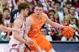 (Andy Manis | AP) Tennessee's Dalton Knecht (3) is defended by Wisconsin's Max Klesmit, left, during the second half of an NCAA college basketball game Friday, Nov. 10, 2023, in Madison, Wis.