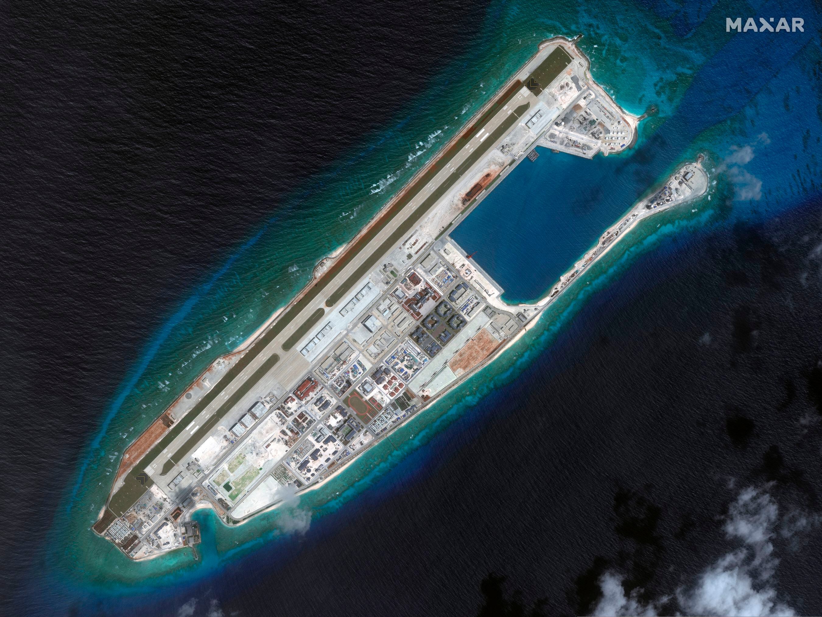 (Satellite image ©2019 Maxar Technologies via AP) This March 2017 image provided by Maxar Technologies shows a satellite image of Fiery Cross Reef in Spratly island chain in the South China Sea. 