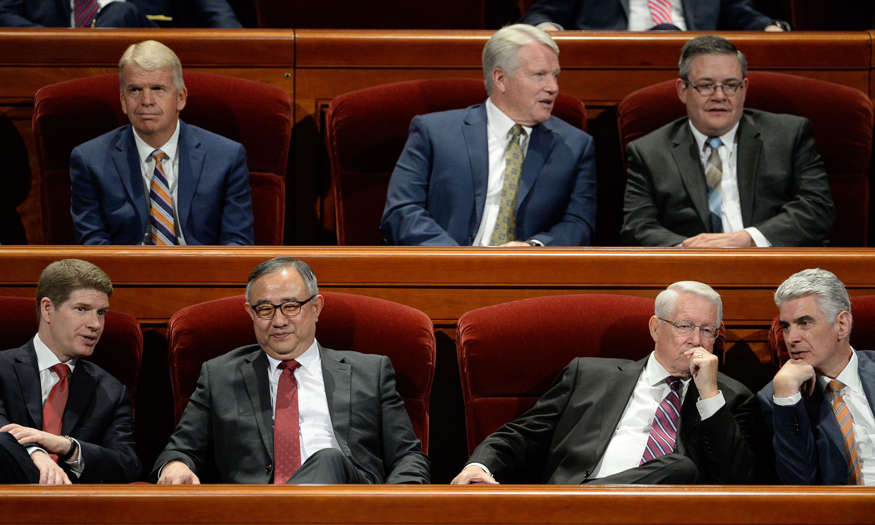 (Francisco Kjolseth | The Salt Lake Tribune) Church leaders converse before the start of the Sunday afternoon session of the 189th twice-annual General Conference of The Church of Jesus Christ of Latter-day Saints at the Conference Center in Salt Lake City on Sunday, Oct. 6, 2019.