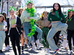 (Rick Egan | The Salt Lake Tribune) Students from Judge Memorial Catholic High School dance in the Saint Patrick's Parade at the Gateway in Salt Lake City, on Saturday, March 12, 2022.
