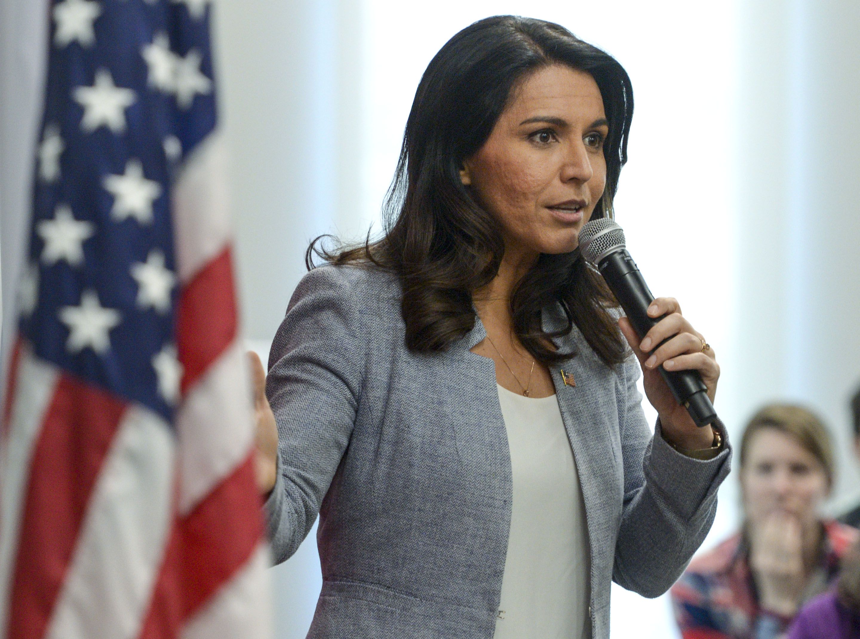 (Leah Hogsten | The Salt Lake Tribune) Tulsi Gabbard, U.S. Representative for Hawaii' and Democratic presidential candidate, delivers her stump speech at a "meet the candidate" event at the University of Utah's Hinckley Institute of Politics, Feb. 21, 2020.