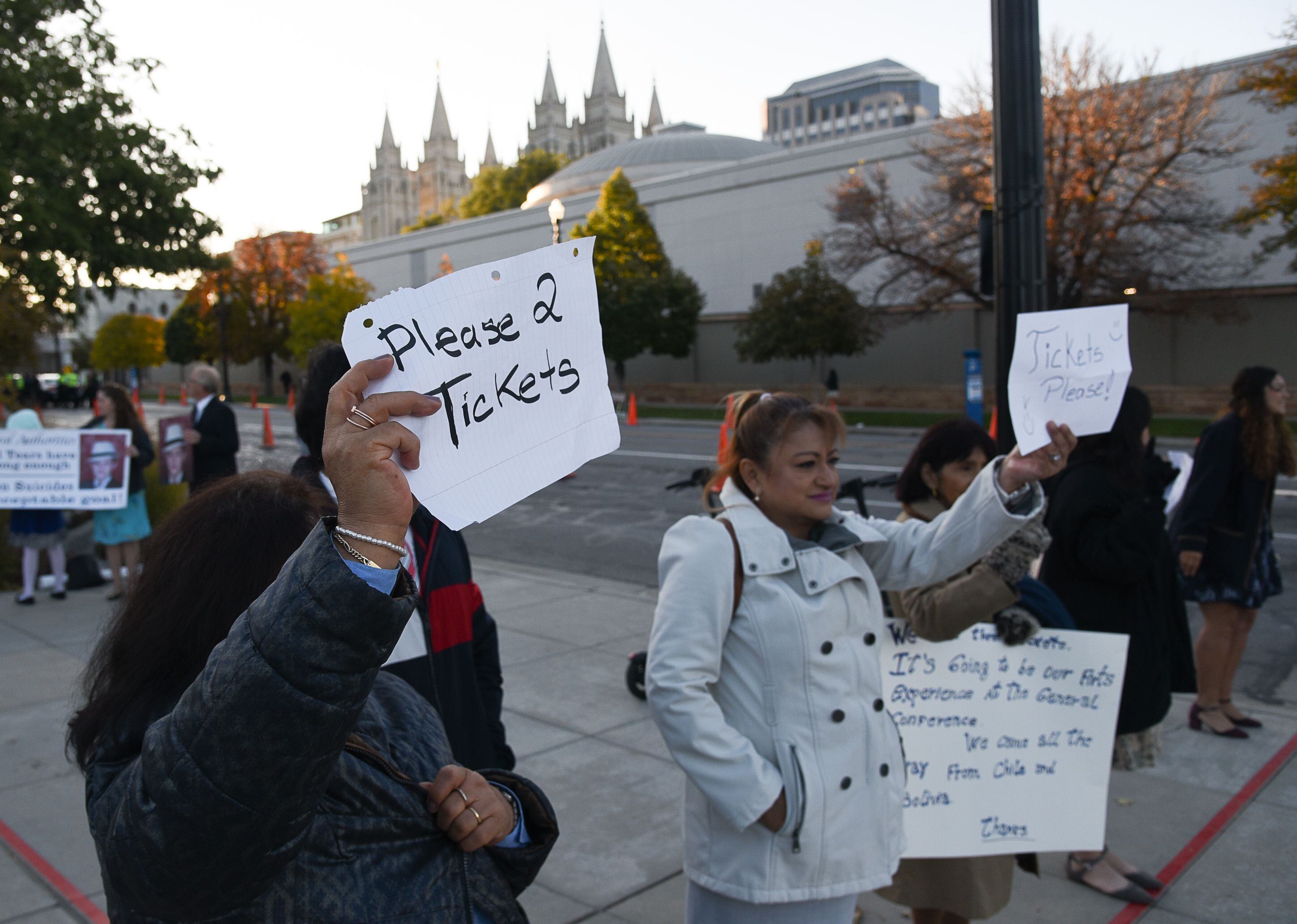 (Francisco Kjolseth | The Salt Lake Tribune) People hope for tickets as they arrive for the Sunday session of the 189th twice-annual General Conference of The Church of Jesus Christ of Latter-day Saints at the Conference Center in Salt Lake City on Sunday, Oct. 6, 2019.