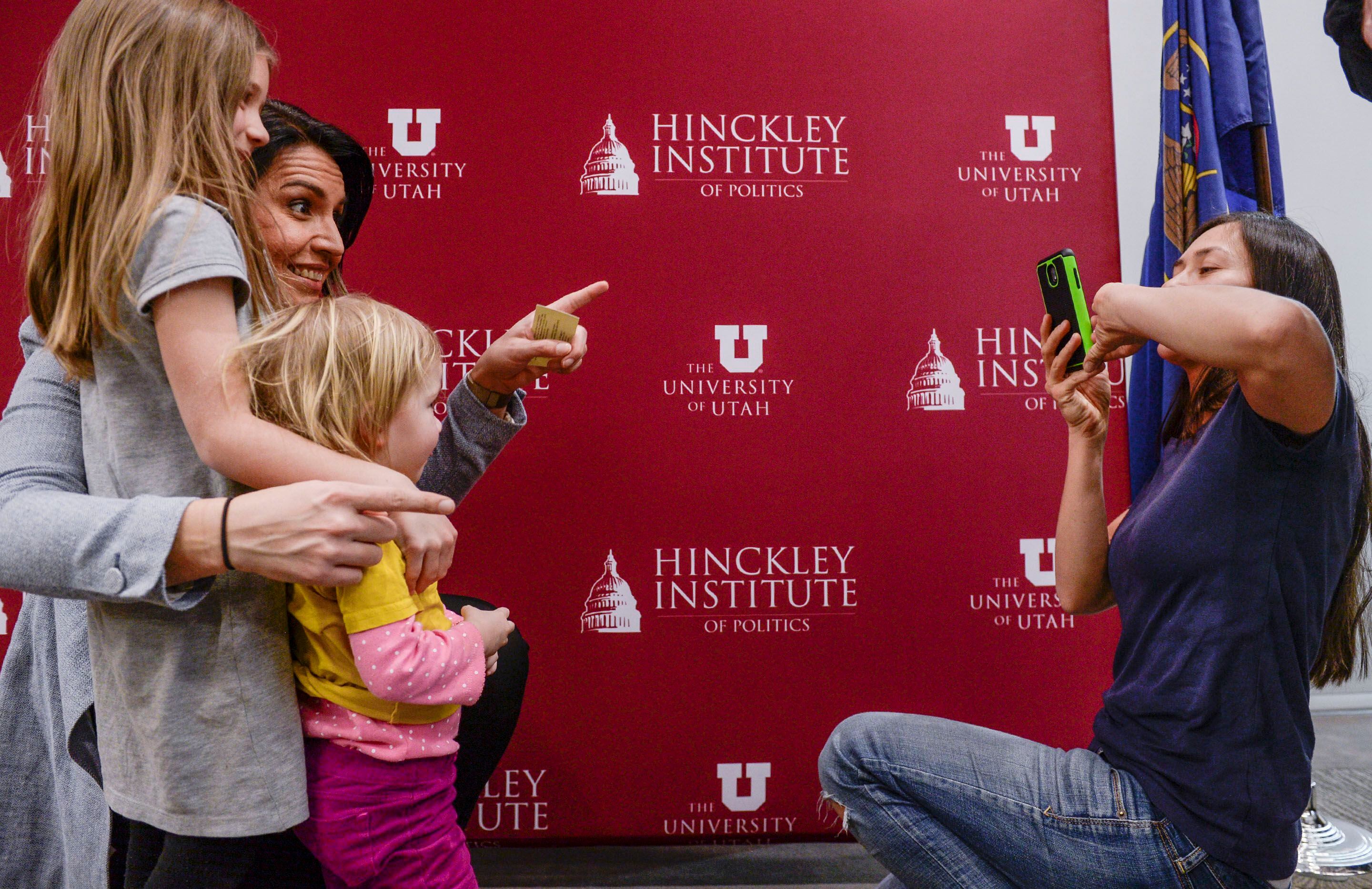 (Leah Hogsten | The Salt Lake Tribune) Tulsi Gabbard tries to get Carly Ferrin's daughters, Nicole and Allison to look at their mother for a photo. "I love your courage," said Ferrin to Gabbard, who is an acquaintance. Tulsi Gabbard, U.S. Representative for Hawaii' and Democratic presidential candidate, delivers her stump speech at a "meet the candidate" event at the University of Utah's Hinckley Institute of Politics, Feb. 21, 2020.