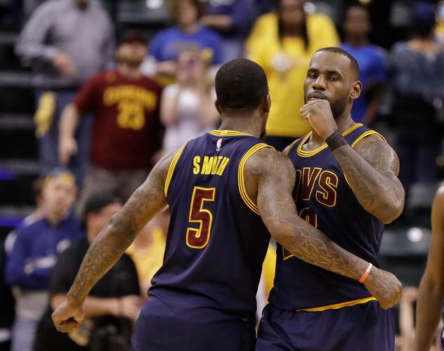 NBA playoffs: James helps Cavs hold off Pacers, earn sweep into