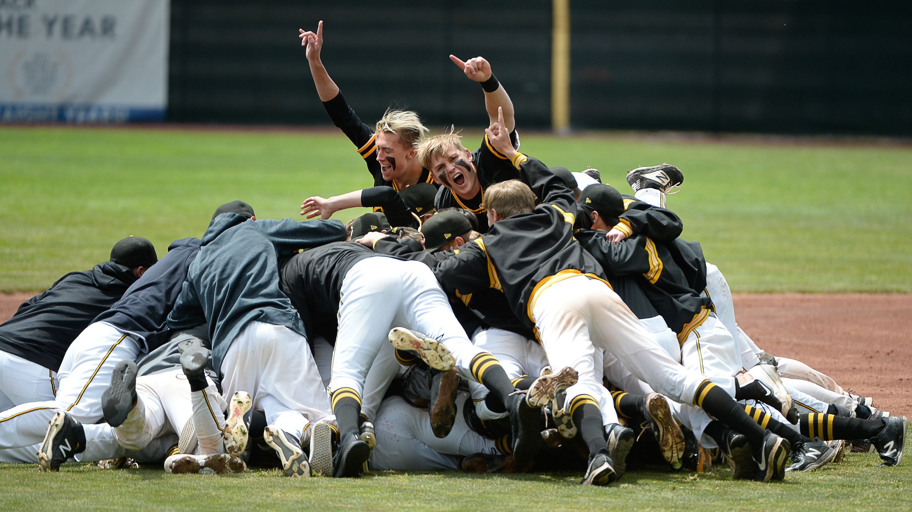 (Francisco Kjolseth | The Salt Lake Tribune) Cottonwood pitcher Carson Angeroth is mobbed by his teammates after striking out Timpanogos in a 6-5 win during the 5A baseball championship game at UCCU Stadium on the UVU campus in Orem, Friday, May 24, 2019.