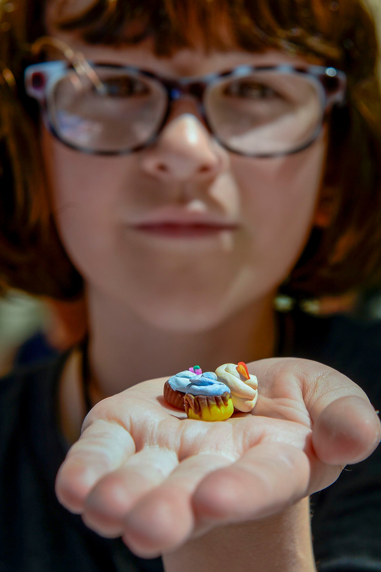 (Leah Hogsten | The Salt Lake Tribune) Imogen Nesse, 9, of Salt Lake City creates reproductions of food, including sushi, fudgesicles, cupcakes and heart-shaped waffles out of polymer clay at Craft Lake CityÕs DIY Festival Kid Row, where children 14 and under make and sell their products. Craft Lake CityÕs DIY Festival is UtahÕs largest local, three day arts festival with over 300 artisans, DIY engineers, vintage vendors and craft food creators.