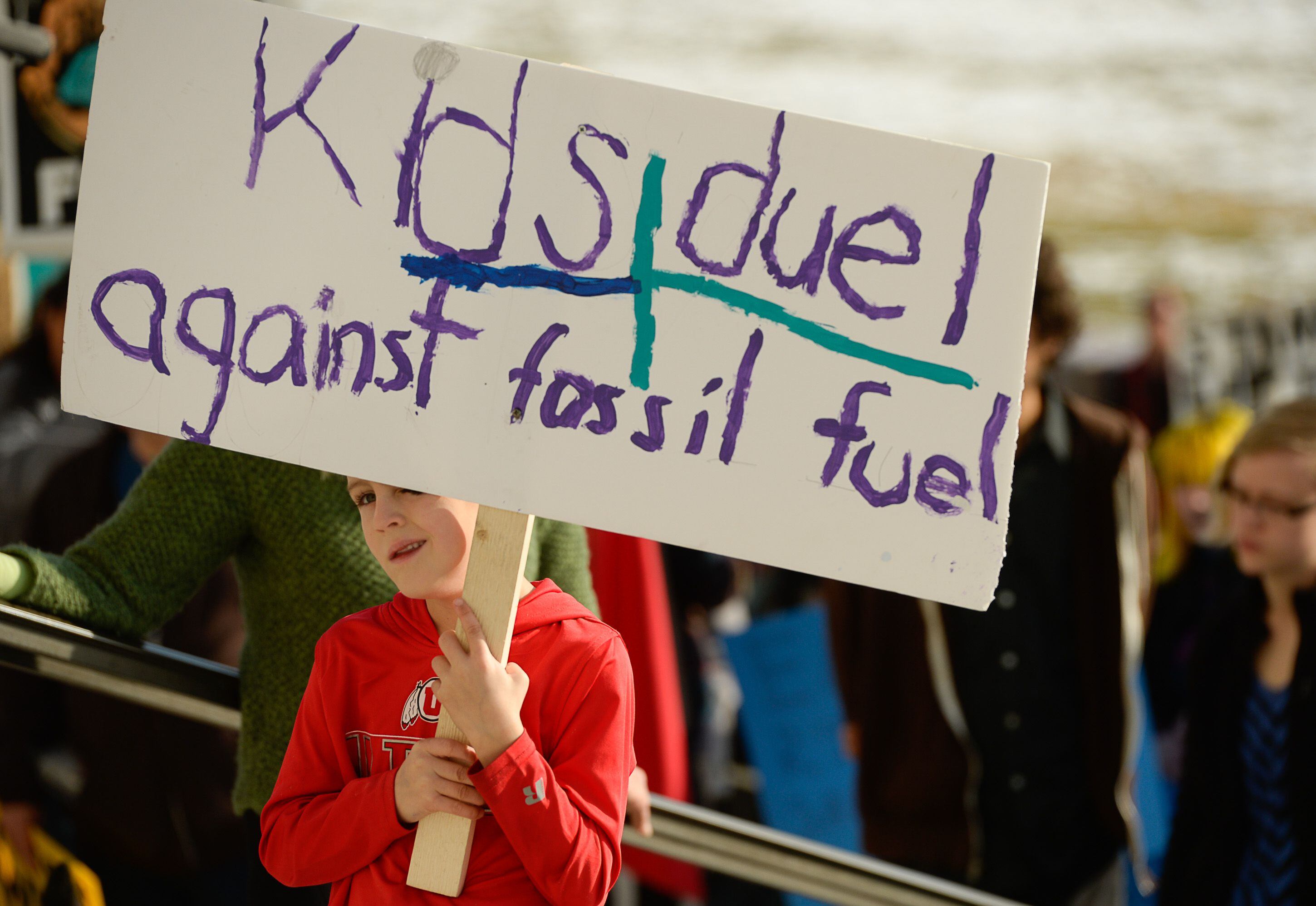 (Francisco Kjolseth | The Salt Lake Tribune) Blake Birrell, 6, joins the fight along with Fridays For Future, Utah Youth Environmental Solutions, and partners as they strike in opposition to UtahÕs final oil and gas lease sale of 2019 that will auction off public lands and further fossil fuel development during a rally on the steps of the Utah Capitol on Friday, Dec. 6, 2019.