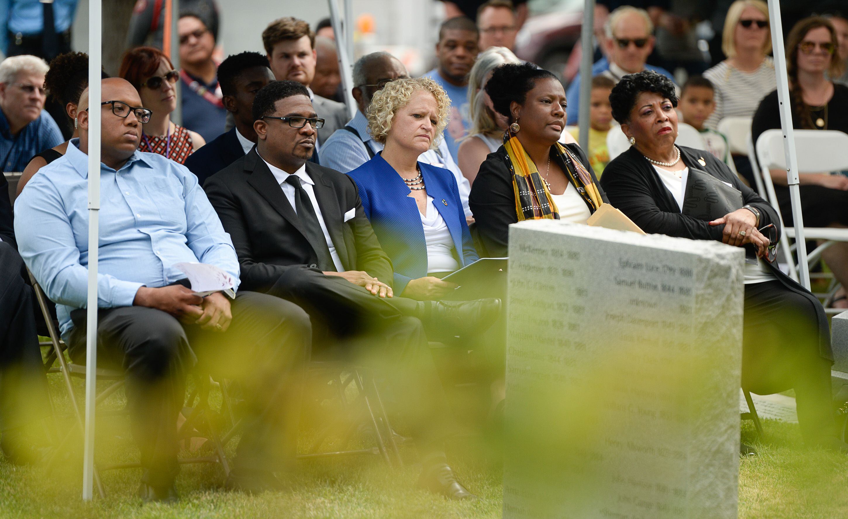 (Francisco Kjolseth | The Salt Lake Tribune) Pastors Marlin Lynch III, Corey Corey Hodges, Mayor Jackie Biskupski, Rep. Sandra Hollins, D-Salt Lake, and NAACP President Jeanetta Williams, from left, attend the dedication of the first grave marker for Tom, an enslaved Black pioneer who was buried in the Salt Lake City Cemetery in 1862, during a ceremony on Thursday, Aug. 22, 2019.