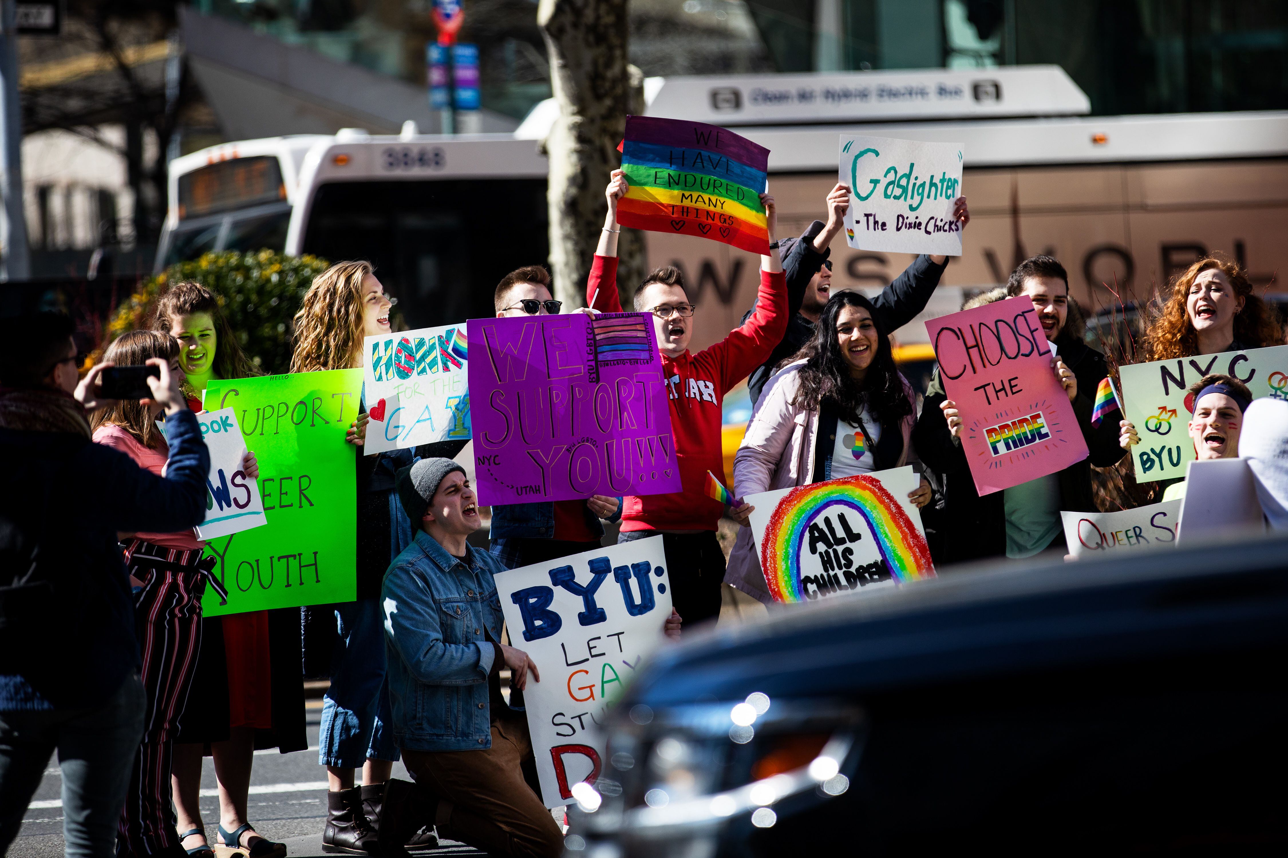 (Demetrius Freeman | for The Salt Lake Tribune) Current and former members of the Church of Jesus Christ of Latter-day Saints, the LGBTQ+ community, and supporters gather at Lincoln square across from the Mormon temple in Manhattan, New York, on March 7, 2020, to stand in solidarity with LGBTQ+ students who attending Brigham Young University. Brigham Young University reinstated homophobic policies in their student handbook that prohibit Òhomosexual behavior.Ó