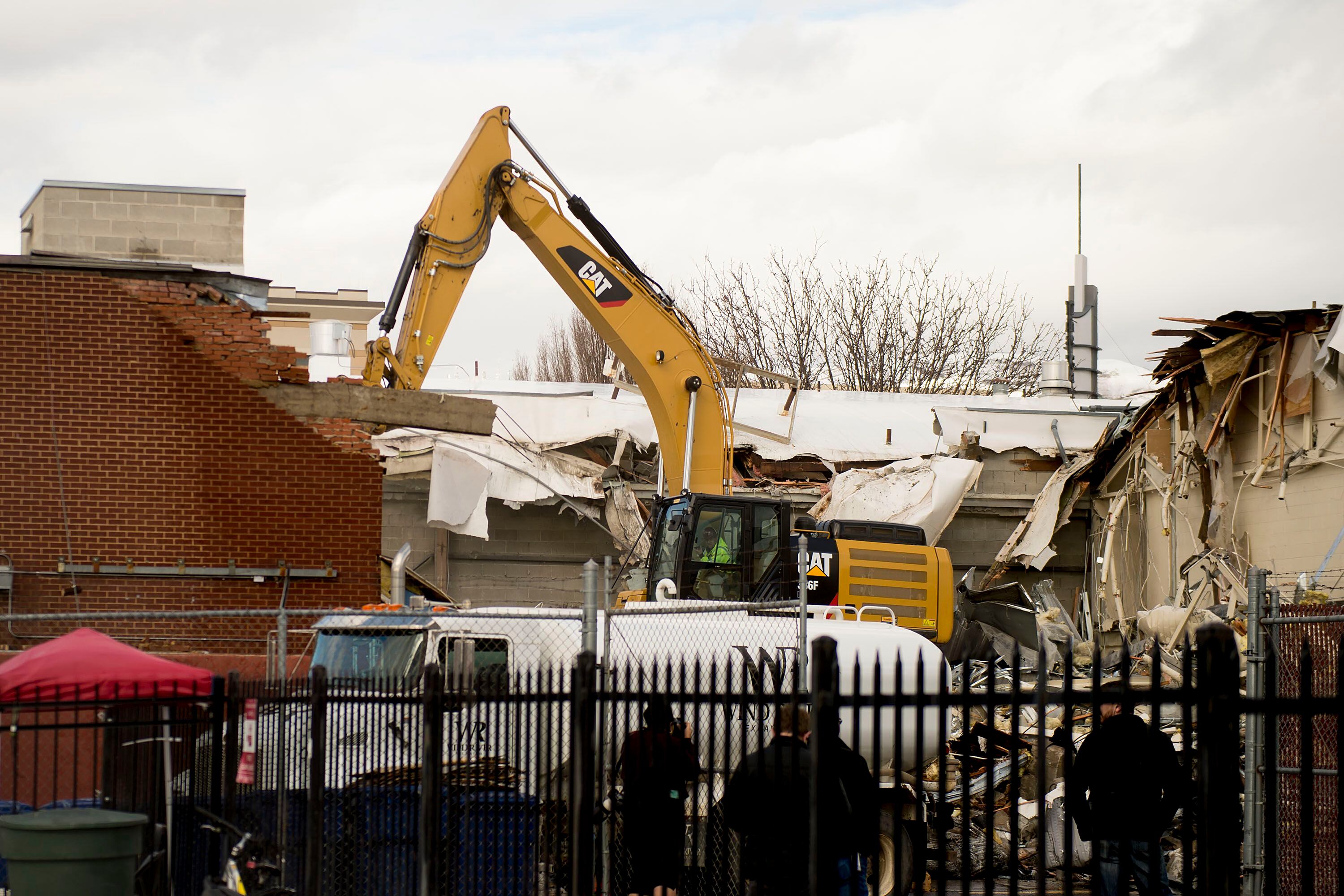 (Jeremy Harmon | The Salt Lake Tribune) Demolition begins on the Road Home shelter in Salt Lake City on Monday, January 27, 2020.