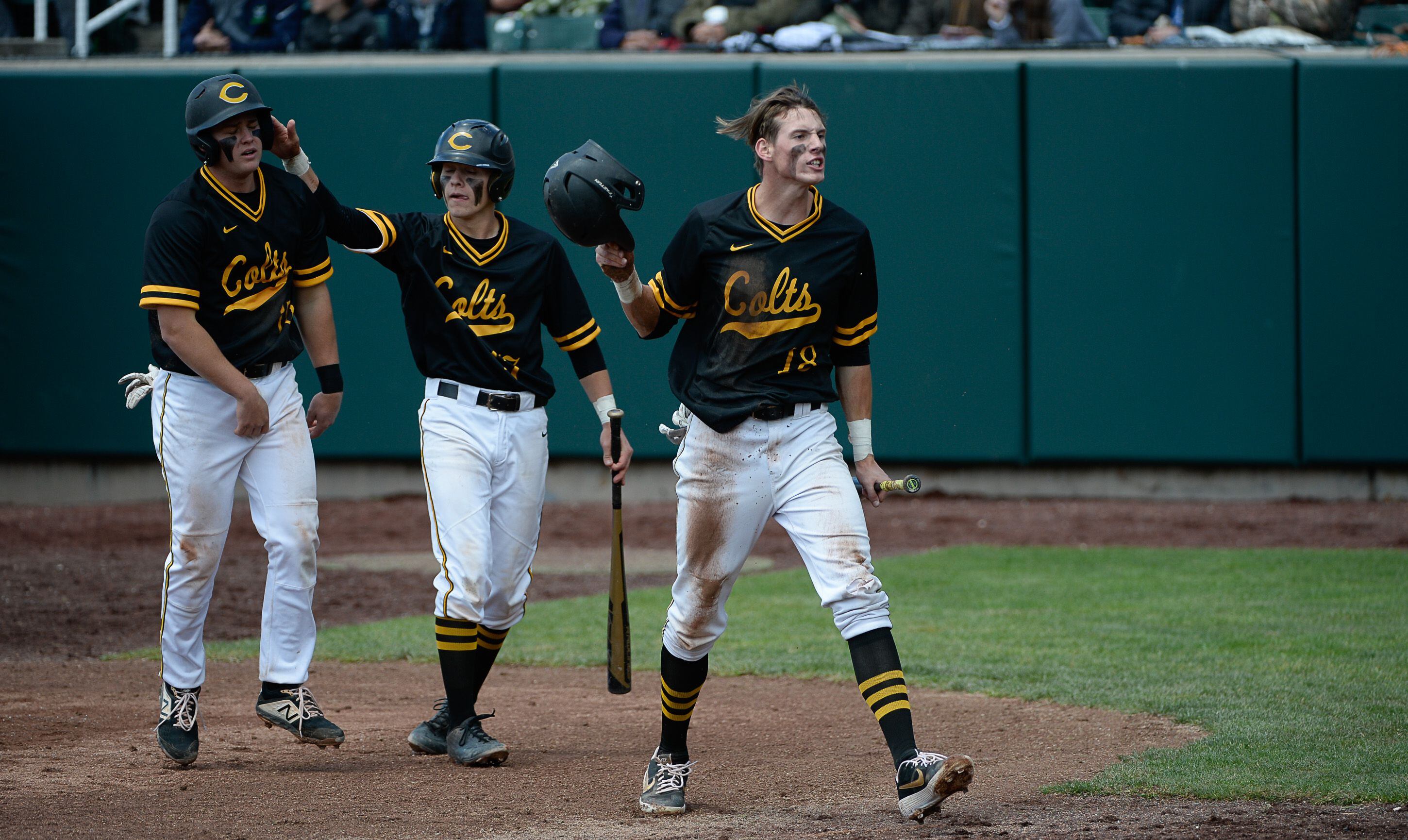 (Francisco Kjolseth | The Salt Lake Tribune) Cottonwood's Dylan Reiser, right, celebrates a run with teammates during the 5A baseball championship game at UCCU Stadium on the UVU campus in Orem, Friday, May 24, 2019.