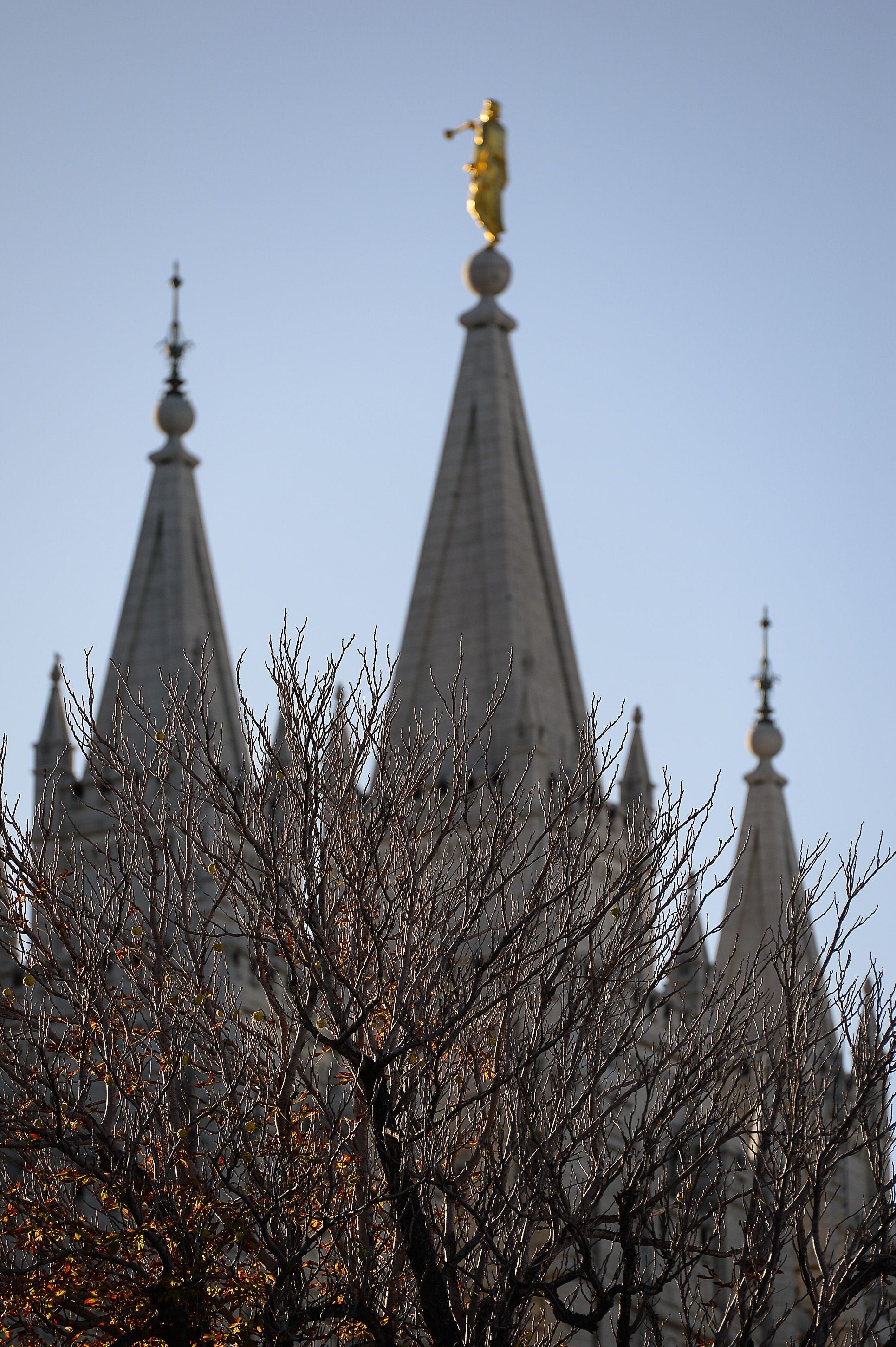 (Francisco Kjolseth | The Salt Lake Tribune) The sun rises as people arrive for the Sunday session of the 189th twice-annual General Conference of The Church of Jesus Christ of Latter-day Saints at the Conference Center in Salt Lake City on Sunday, Oct. 6, 2019.