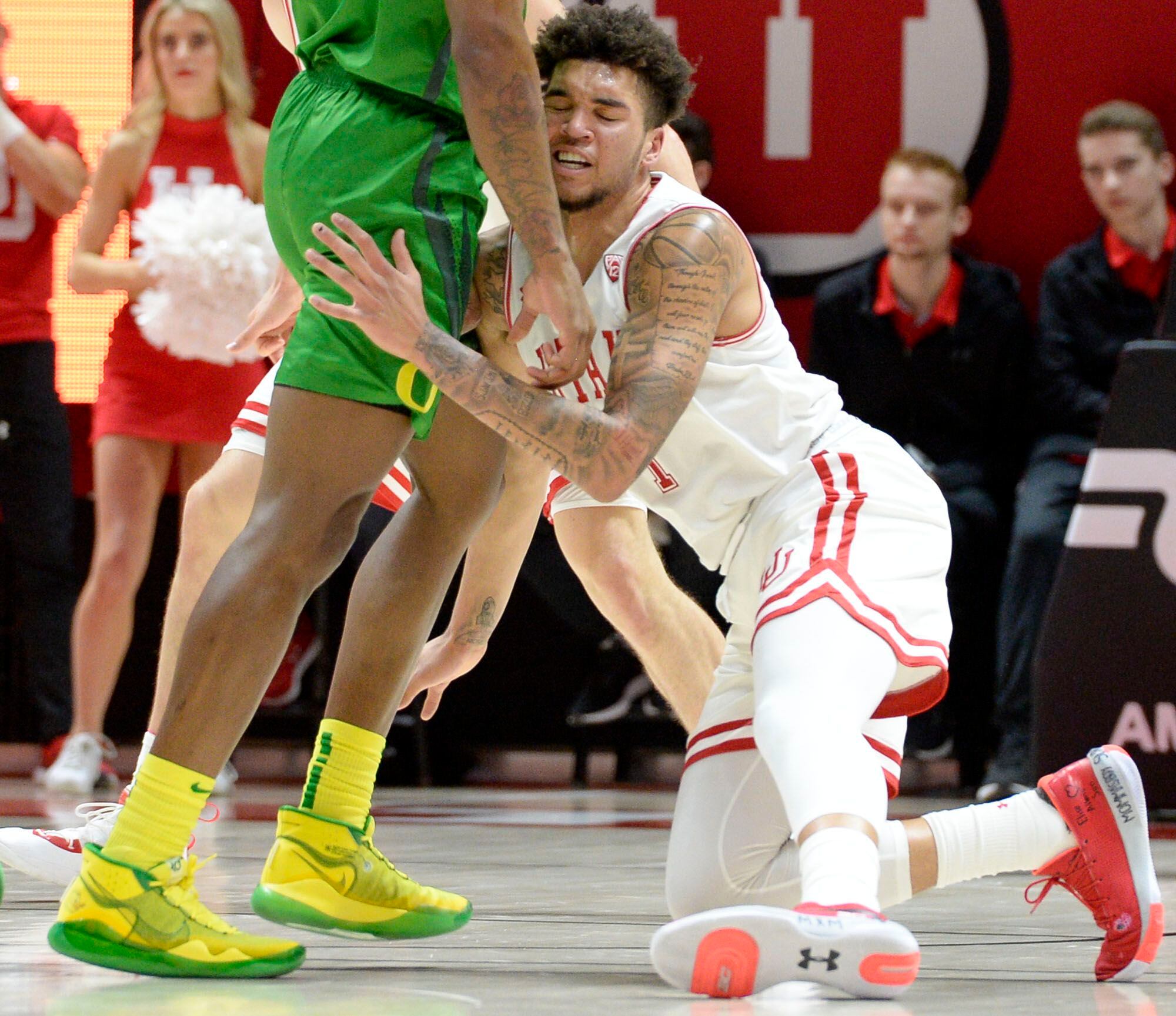 (Leah Hogsten | The Salt Lake Tribune) Utah Utes forward Timmy Allen (1) slips on the court as the University of Utah basketball team hosts No. 4 Oregon, Jan. 4, 2020, at the Huntsman Center.