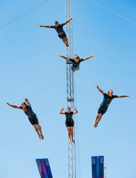 (Rick Egan | The Salt Lake Tribune) Five divers from the Flying Fools High Dive show, dive into a 10-foot pool of water at the same time, on opening day of the Utah State Fair, Thursday, Sept. 6, 2018. 