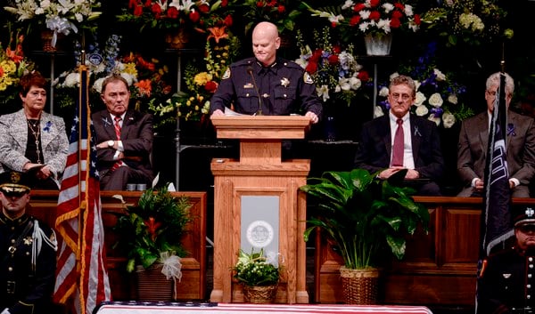 Provo police officer remembered as a hero, and a man who snuggled his toddler son to sleep