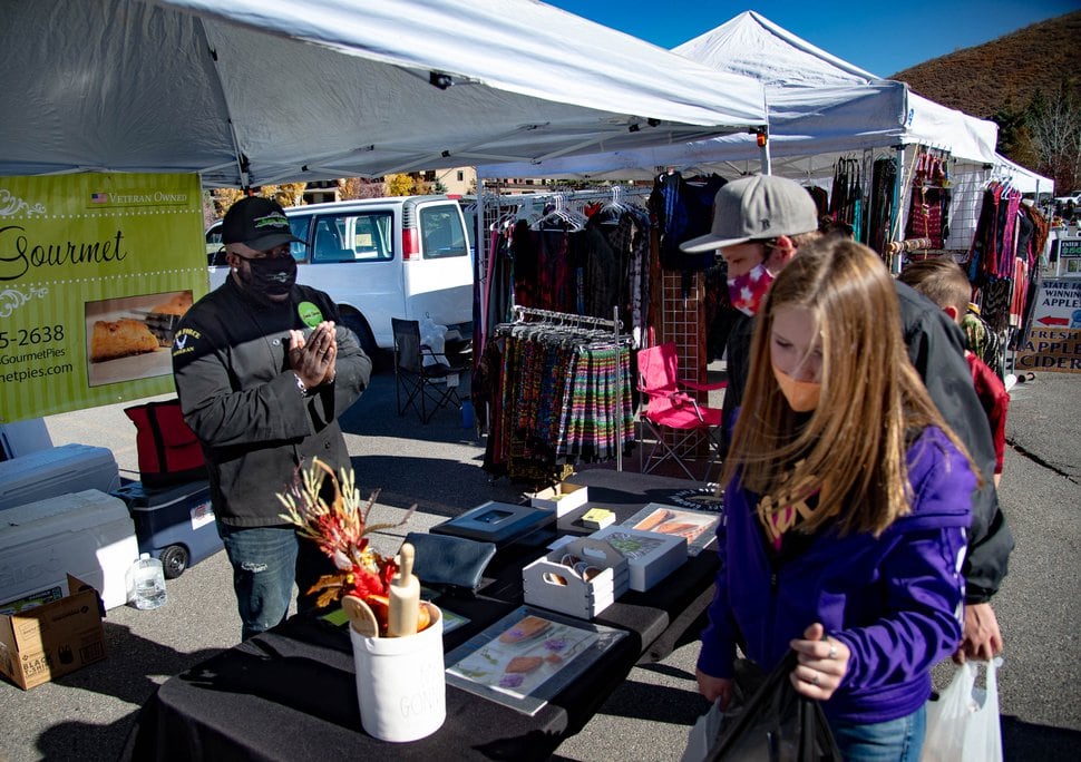 (Francisco Kjolseth | The Salt Lake Tribune) James Edwards, owner of James' Gourmet Pies, thanks customers at the Park City farmers market on Wednesday, Oct. 21, 2020. Edwards sells both mini and full-size pies at farmers markets along the Wasatch Front.