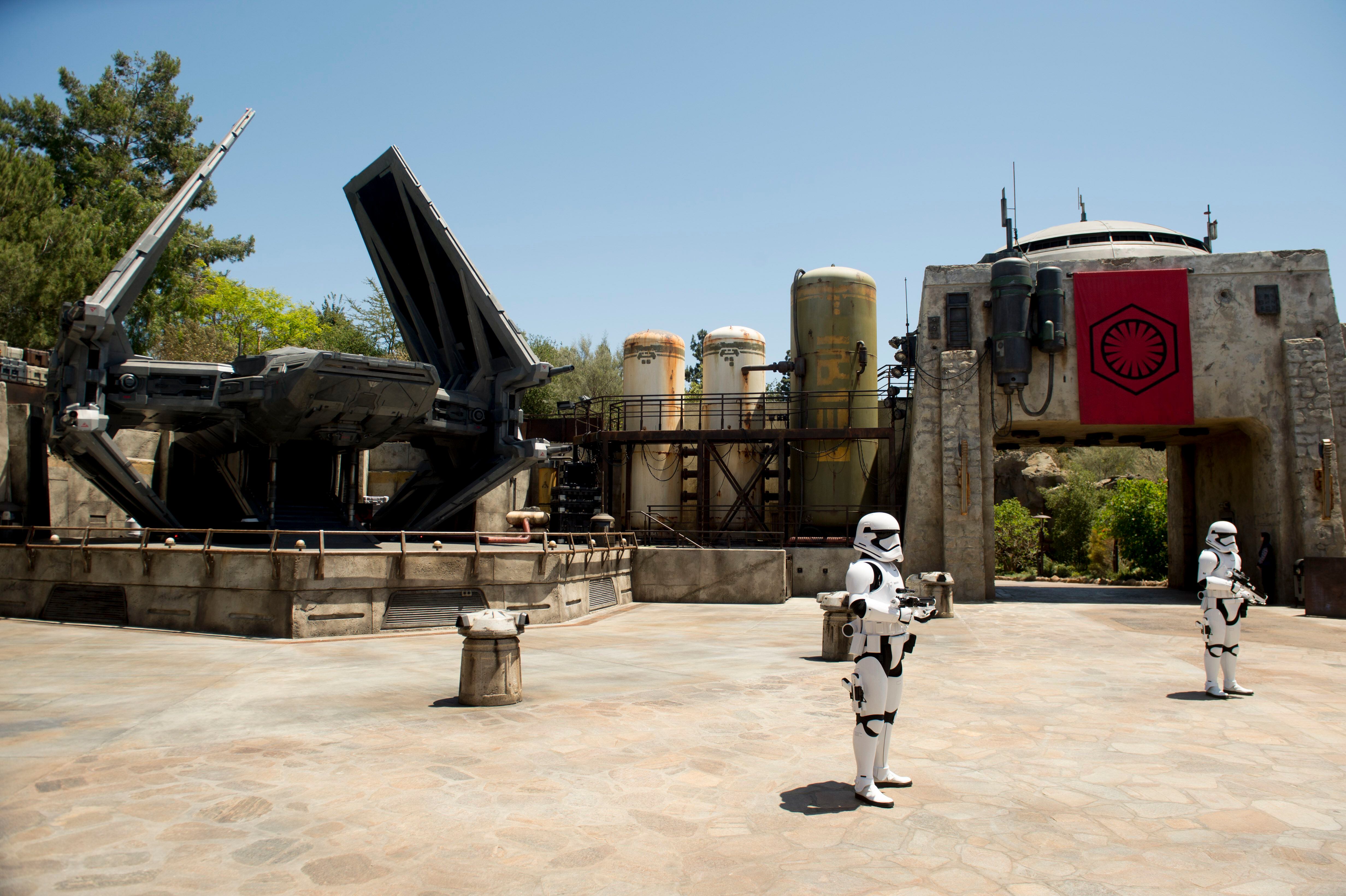 (Jeremy Harmon | The Salt Lake Tribune) First Order Stormtroopers patrol an area at Star Wars: Galaxy's Edge in Anaheim, Ca. on Wednesday, May 29, 2019.