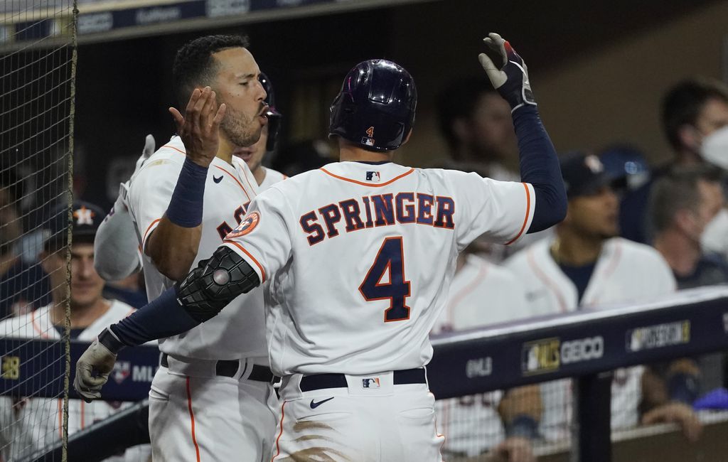 George Springer of the Houston Astros steals second base in the
