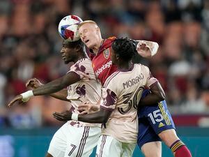 (Rick Bowmer | AP) Real Salt Lake defender Justen Glad (15) competes against Portland Timbers' Santiago Moreno (30) and Franck Boli (7) during the first half of an MLS soccer match Wednesday, May 17, 2023, in Sandy, Utah.