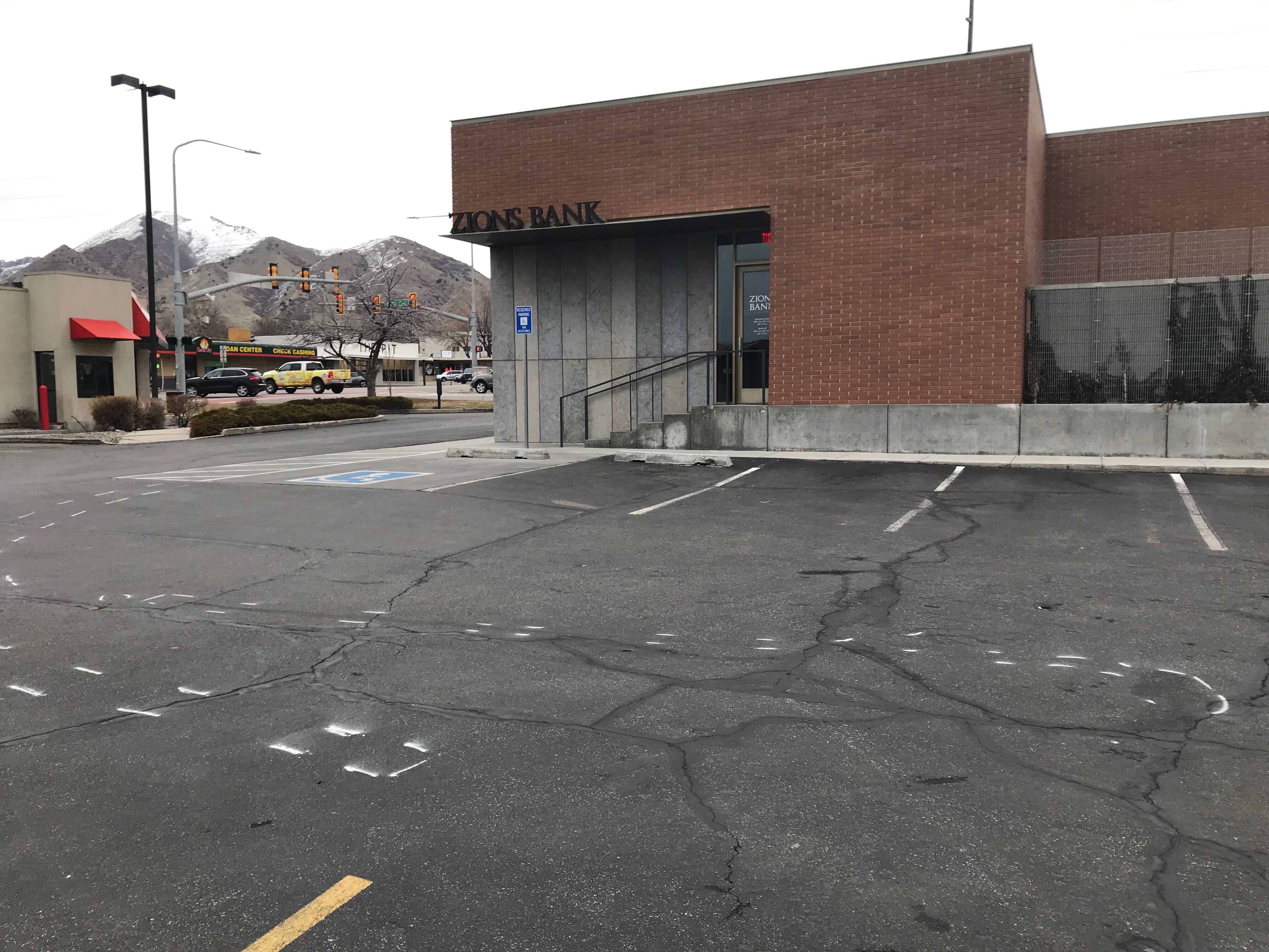 (Nate Carlisle | The Salt Lake Tribune) Paint marks the scene where a Unified Police Department officer ran over a woman in a parking lot on the night of March 6, 2019, at 3300 S. 2300 East in Millcreek.