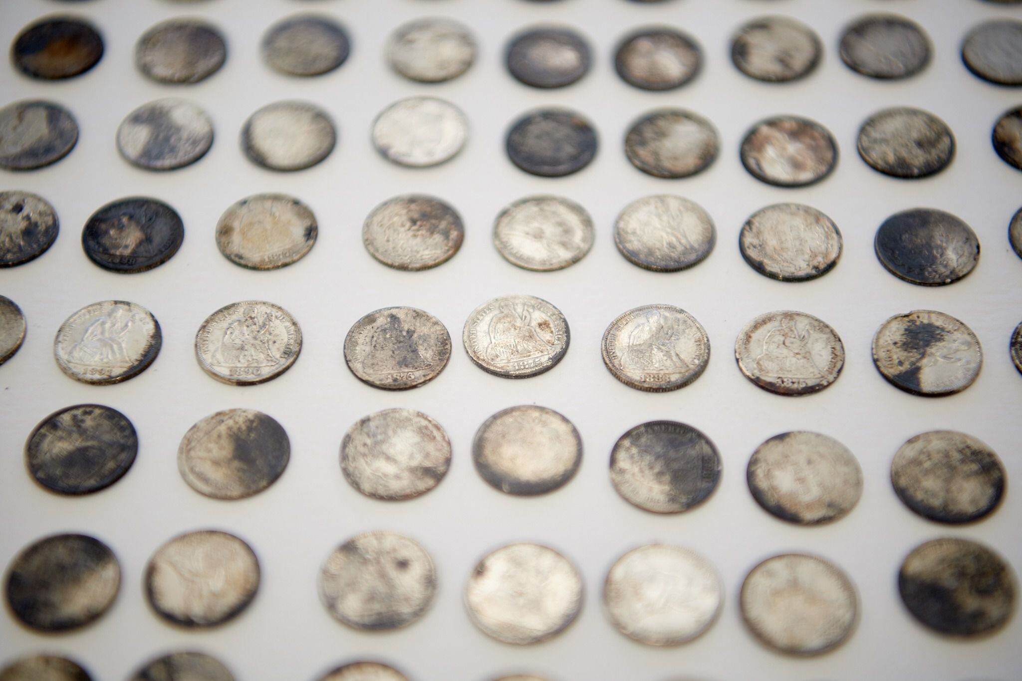 (photo courtesy The Church of Jesus Christ of Latter-day Saints) These coins were deposited in the capstone of the Salt Lake Temple on April 6, 1892. Some 400 coinsÑmostly nickels and dimes, some pennies, a few quartersÑhave been found inside the concrete.