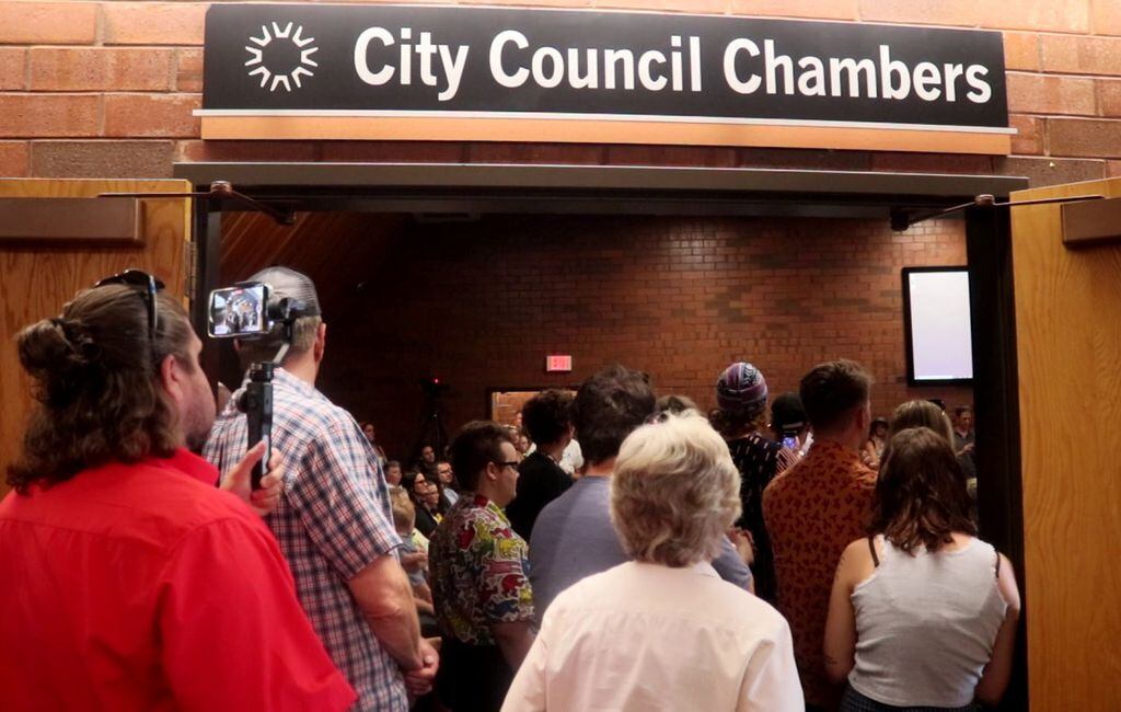 (Mori Kessler | St. George News) Members and supporters of the LGBTQ community pile into the St. George City Council chambers to voice their concerns during a City Council meeting. The Southern Utah Drag Stars group sued St. George and city leaders on Tuesday, May 23, 2023, accusing them of discrimination for denying their permit application to host an all-ages drag show at a local park.