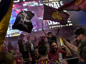 (Leah Hogsten | The Salt Lake Tribune)  Members of La Barra Real cheer on Real Salt Lake during their game against the LA Galaxy, May 31, 2023. America First Field installed metal bars in part of the south goal section of the stadium and took out the seats to make it so the fans in that section can stand the entire game. 