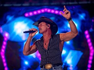 (Trent Nelson  |  The Salt Lake Tribune) Tim McGraw performs at Stadium of Fire in Provo on Saturday, July 2, 2022.