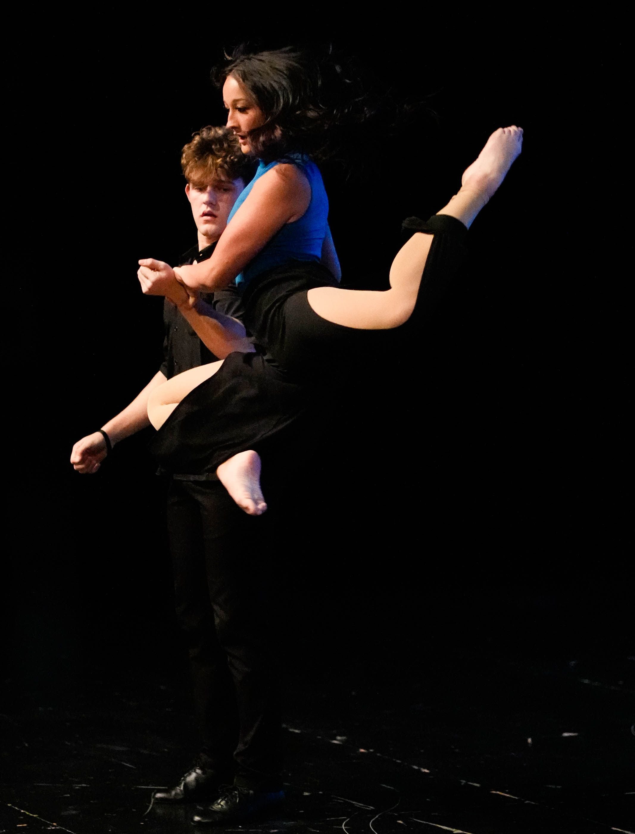 (Francisco Kjolseth | The Salt Lake Tribune) Nikkole Dong and dance partner Zachary Powell perform on stage at Grantsville High School during an end of year ballroom dance production on Thursday, May 4, 2023. Dong, 17, who has used dance to express herself since she was about 3, put her athleticism to test by joined the wrestling team, gaining strength and self-confidence in the process. 