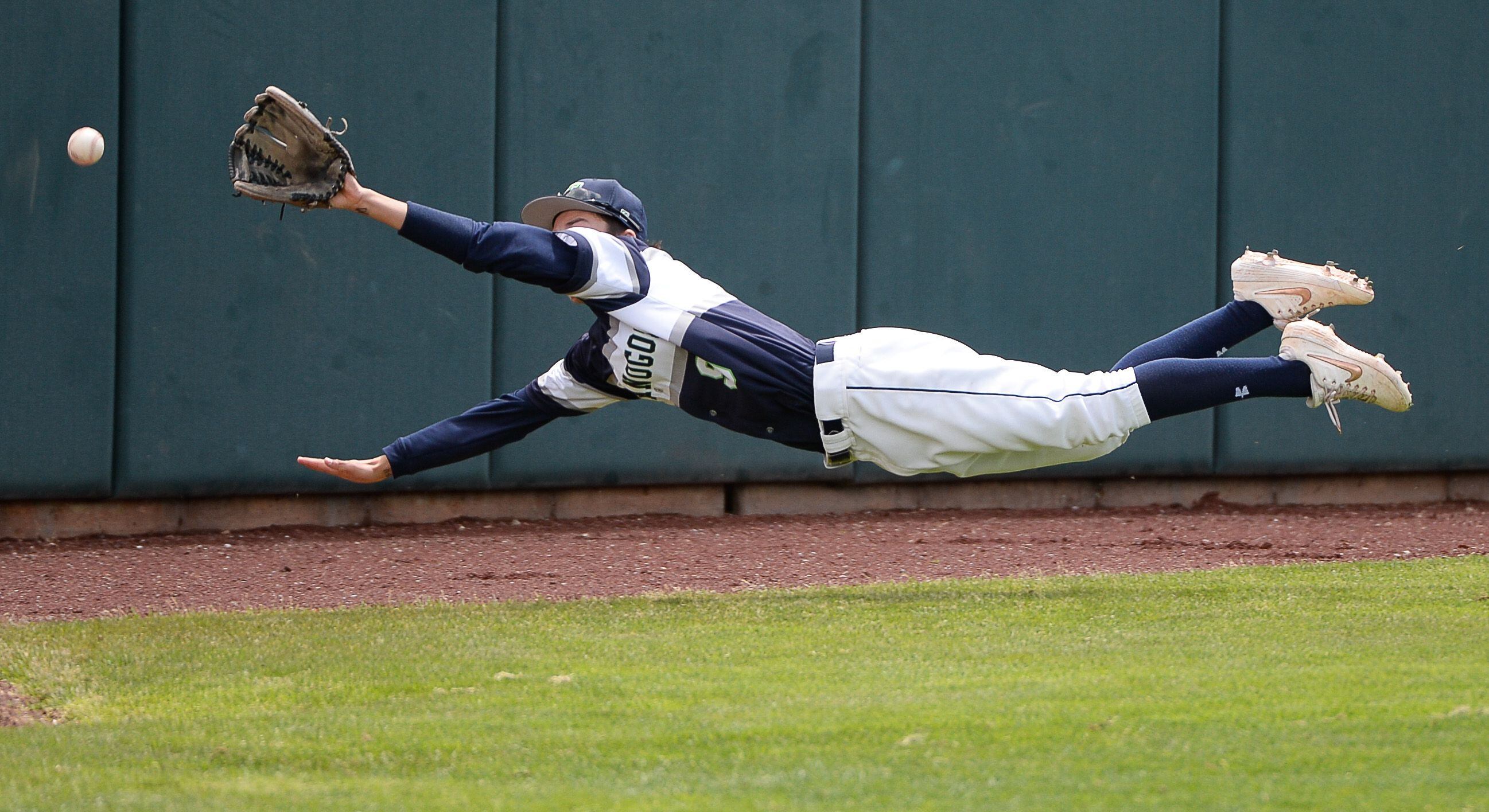 (Francisco Kjolseth | The Salt Lake Tribune) Krew Erickson of Timpanogos stretches out for catch attempt as Cottonwood gains two runs that puts them up 6-5 for the win during the 5A baseball championship game at UCCU Stadium on the UVU campus in Orem, Friday, May 24, 2019.